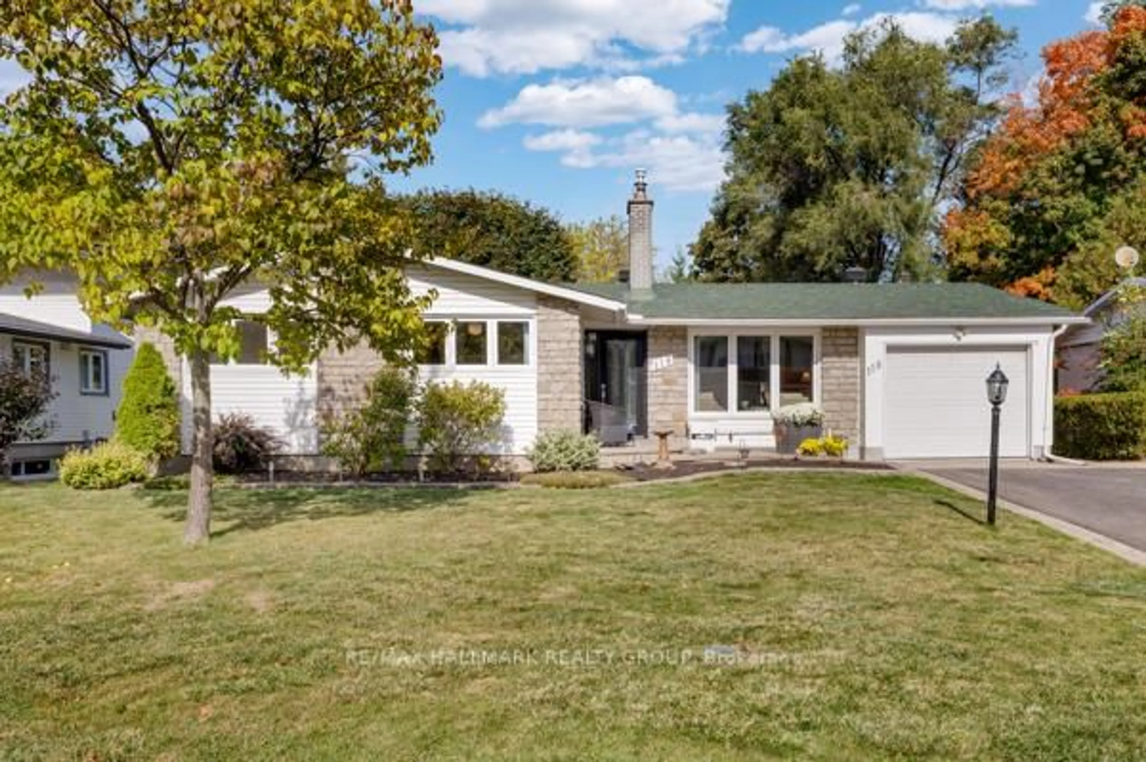 Home with vinyl exterior material, street for 118 Queensline Dr, Ottawa Ontario K2H 7J5