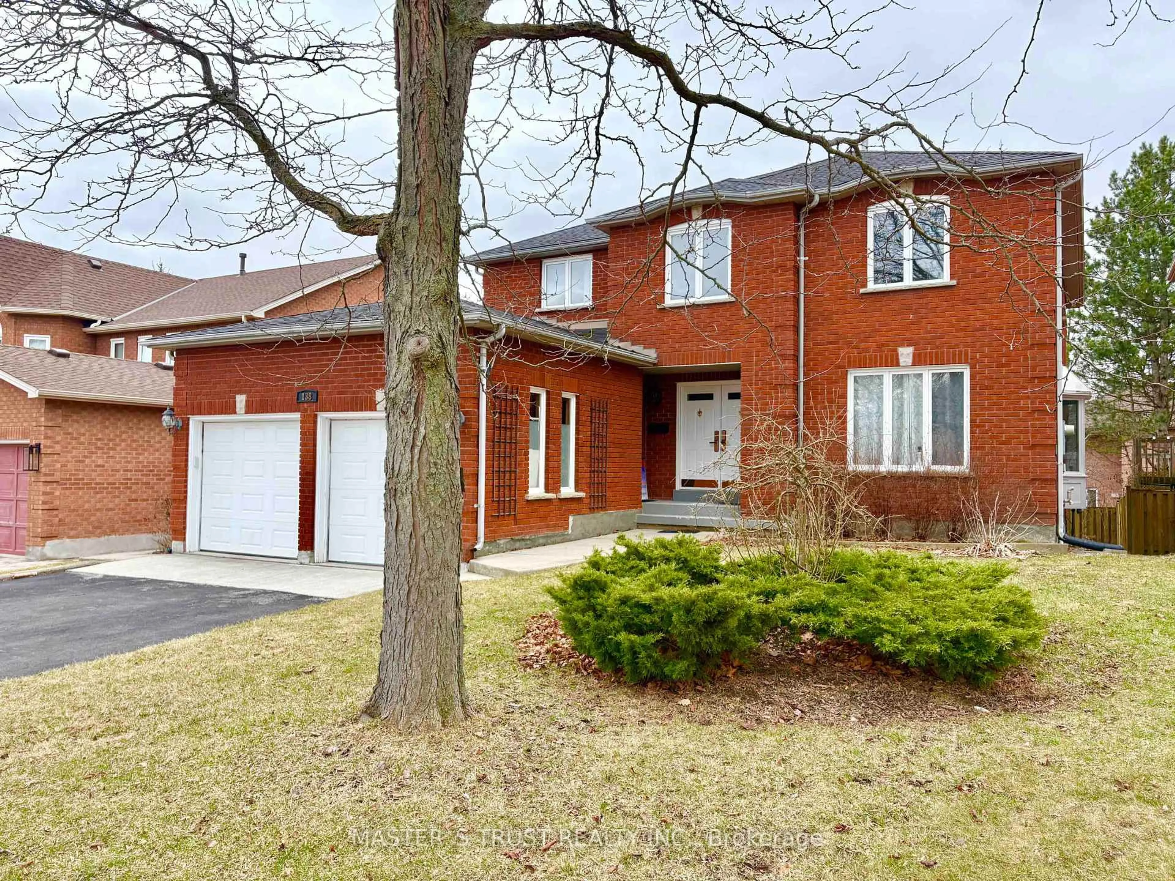 Home with brick exterior material, street for 138 Huntingwood Ave, Hamilton Ontario L9H 6X7