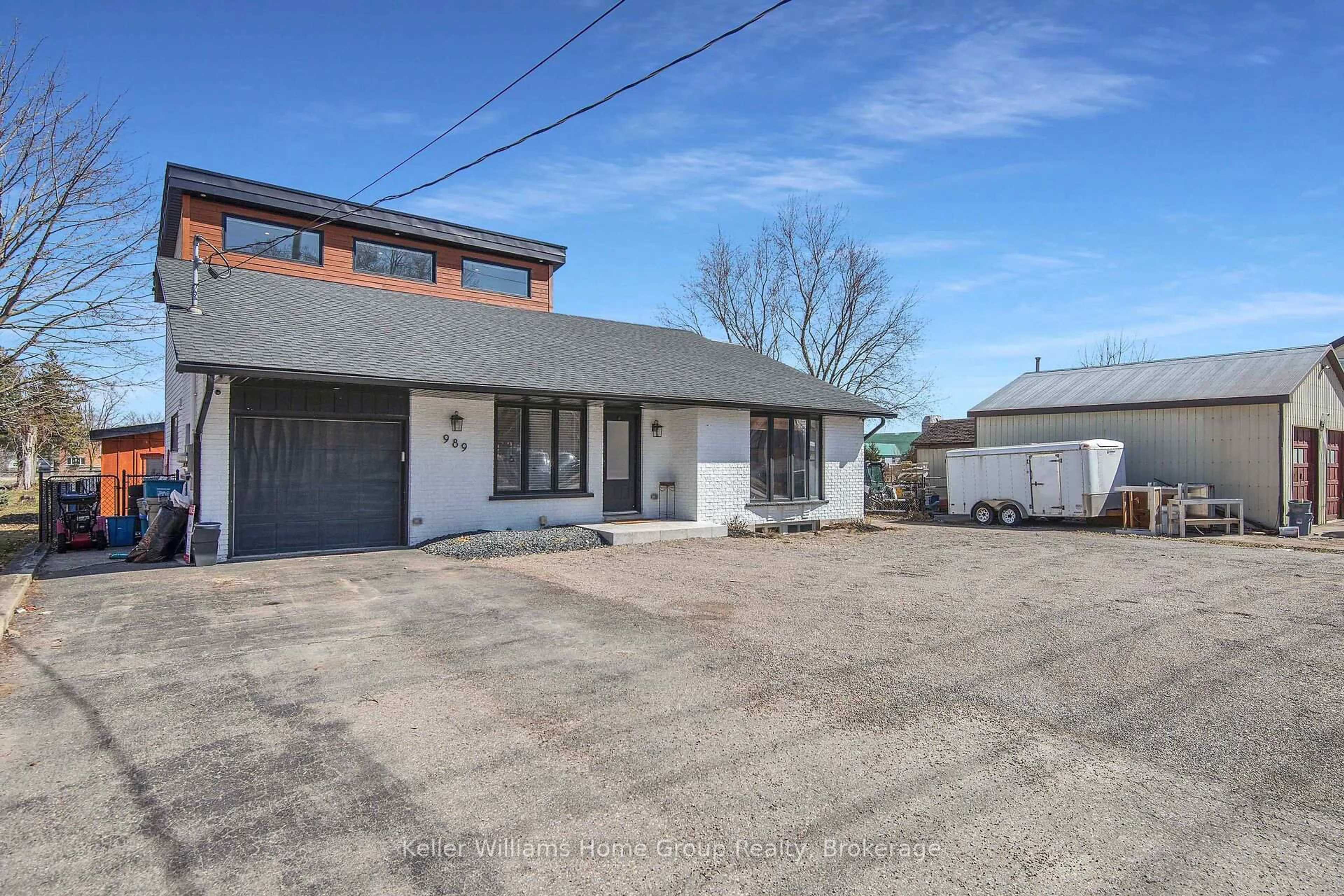 A pic from outside/outdoor area/front of a property/back of a property/a pic from drone, street for 989 Northfield Dr, Woolwich Ontario N0B 1N0