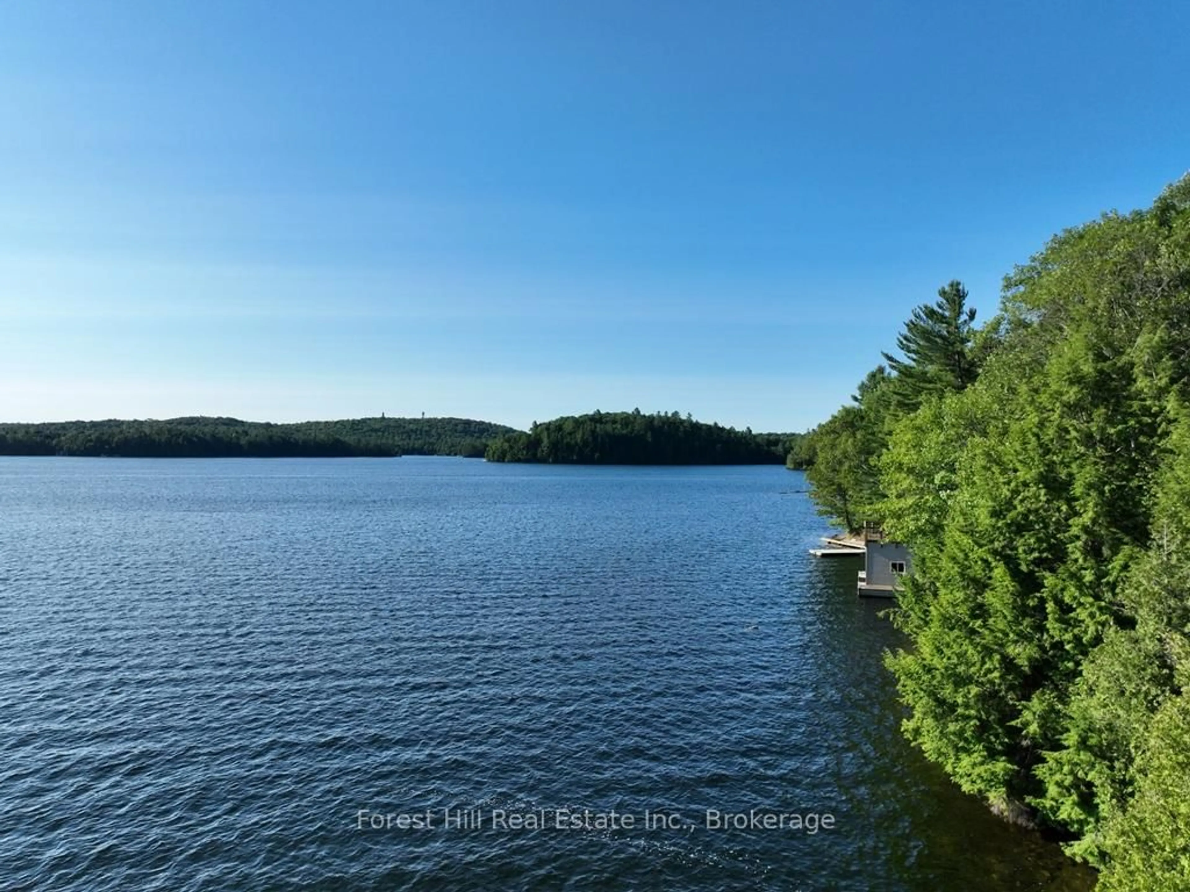 A pic from outside/outdoor area/front of a property/back of a property/a pic from drone, water/lake/river/ocean view for 10689 Kawagama Lake WAO, Algonquin Highlands Ontario P0A 1E0
