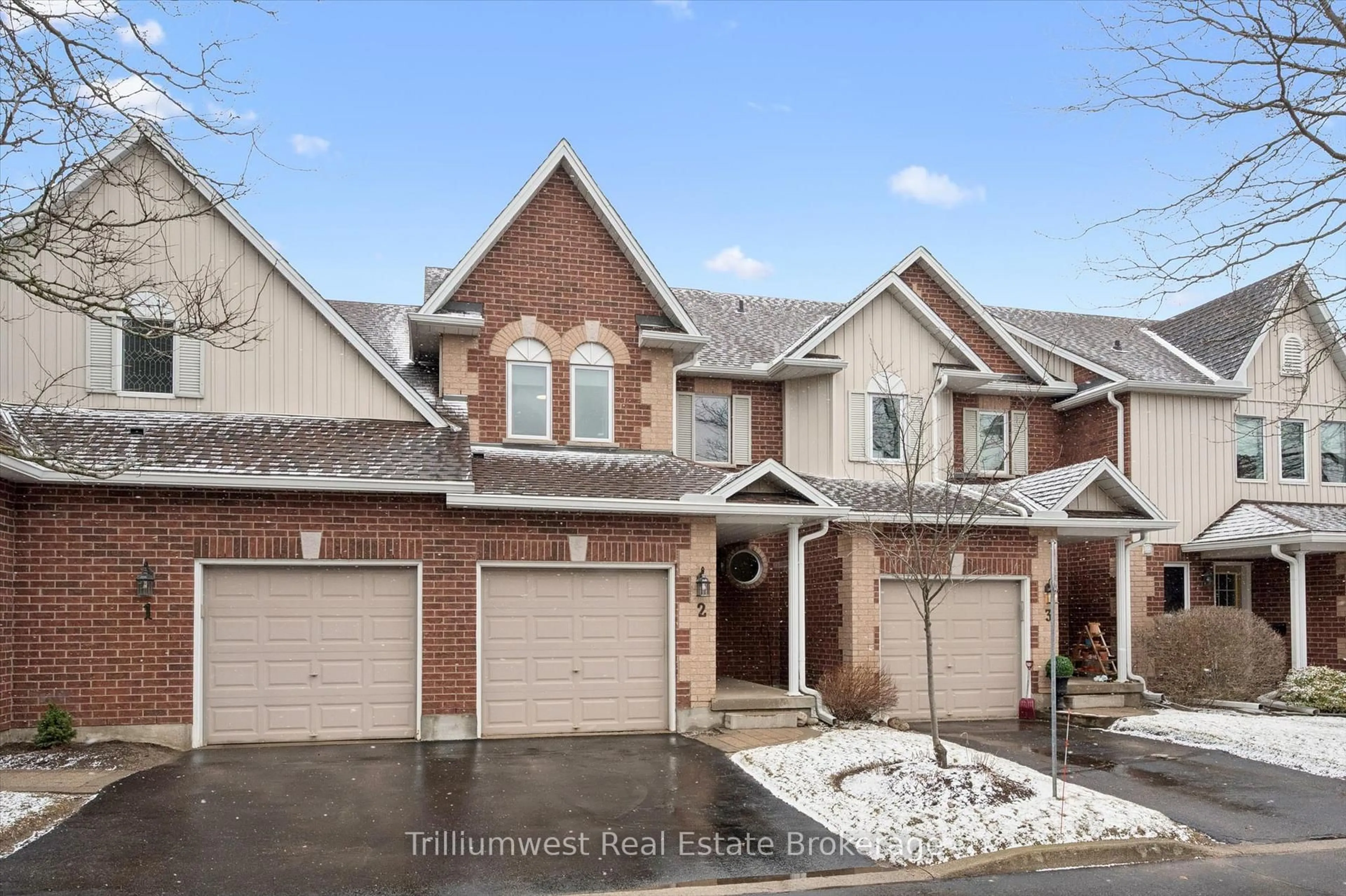 Home with brick exterior material, street for 39 Ptarmigan Dr #Unit 2, Guelph Ontario N1C 1E8