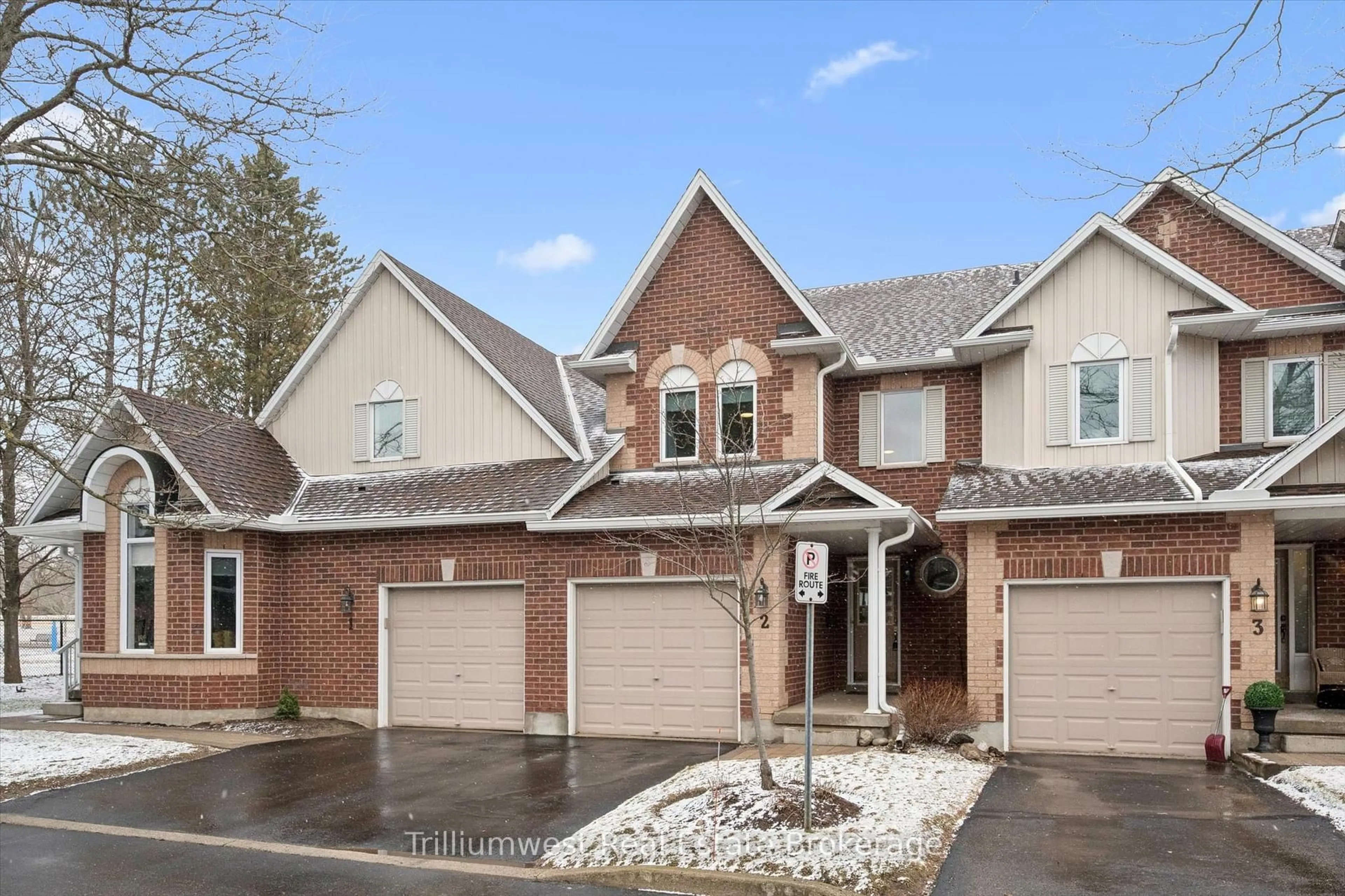 Home with brick exterior material, street for 39 Ptarmigan Dr #Unit 2, Guelph Ontario N1C 1E8