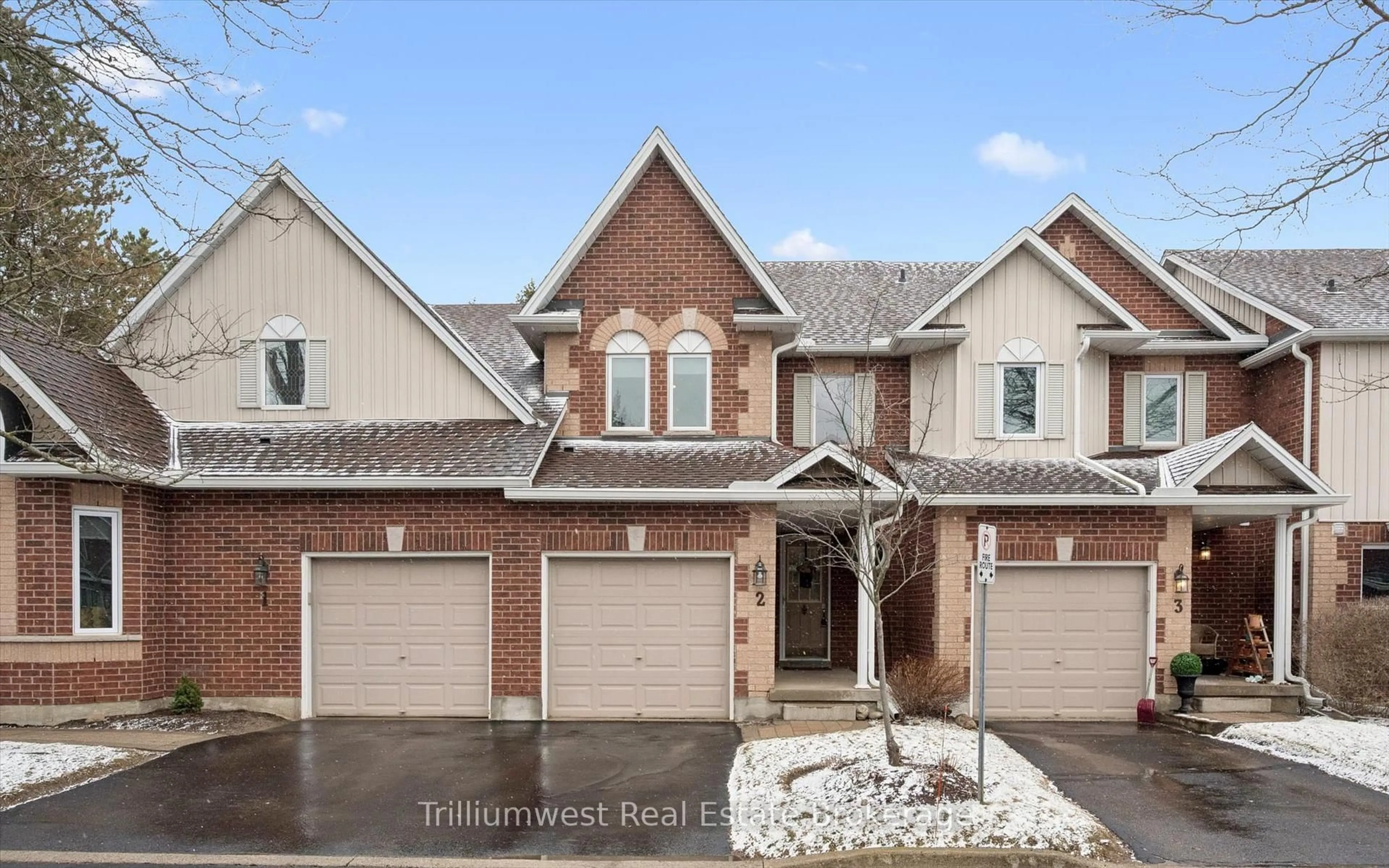 Home with brick exterior material, street for 39 Ptarmigan Dr #Unit 2, Guelph Ontario N1C 1E8