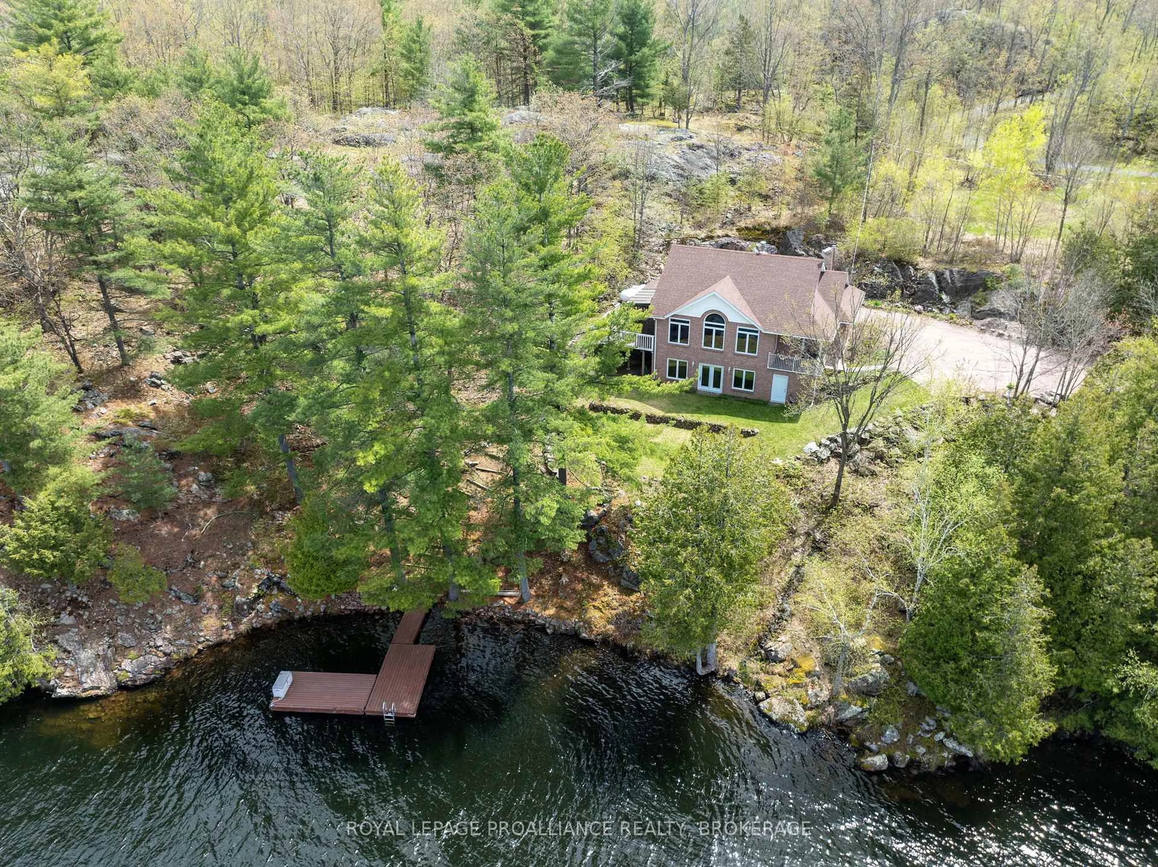 A pic from outside/outdoor area/front of a property/back of a property/a pic from drone, water/lake/river/ocean view for 1133 Sassy Tree Lane, Hartington Ontario K0H 1W0