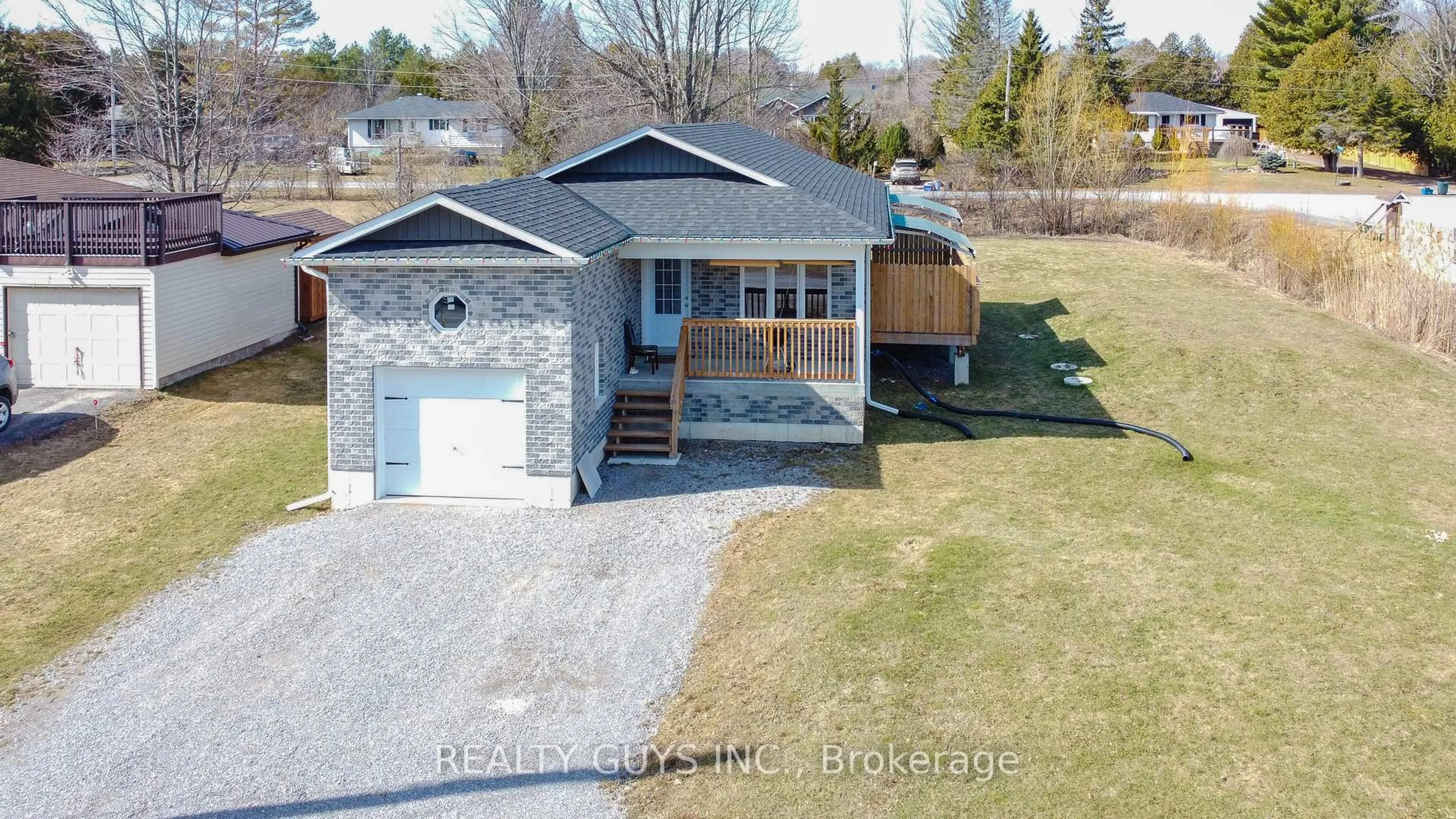 A pic from outside/outdoor area/front of a property/back of a property/a pic from drone, street for 223 Crosby Dr, Kawartha Lakes Ontario K0M 1A0