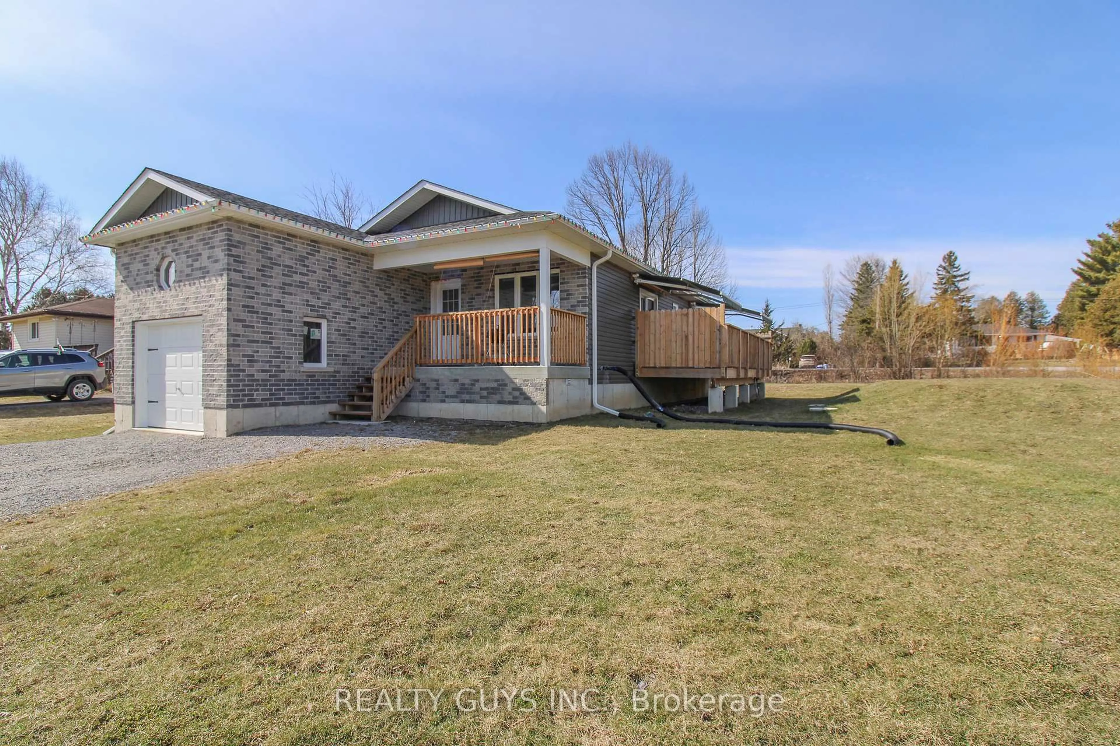 A pic from outside/outdoor area/front of a property/back of a property/a pic from drone, unknown for 223 Crosby Dr, Kawartha Lakes Ontario K0M 1A0