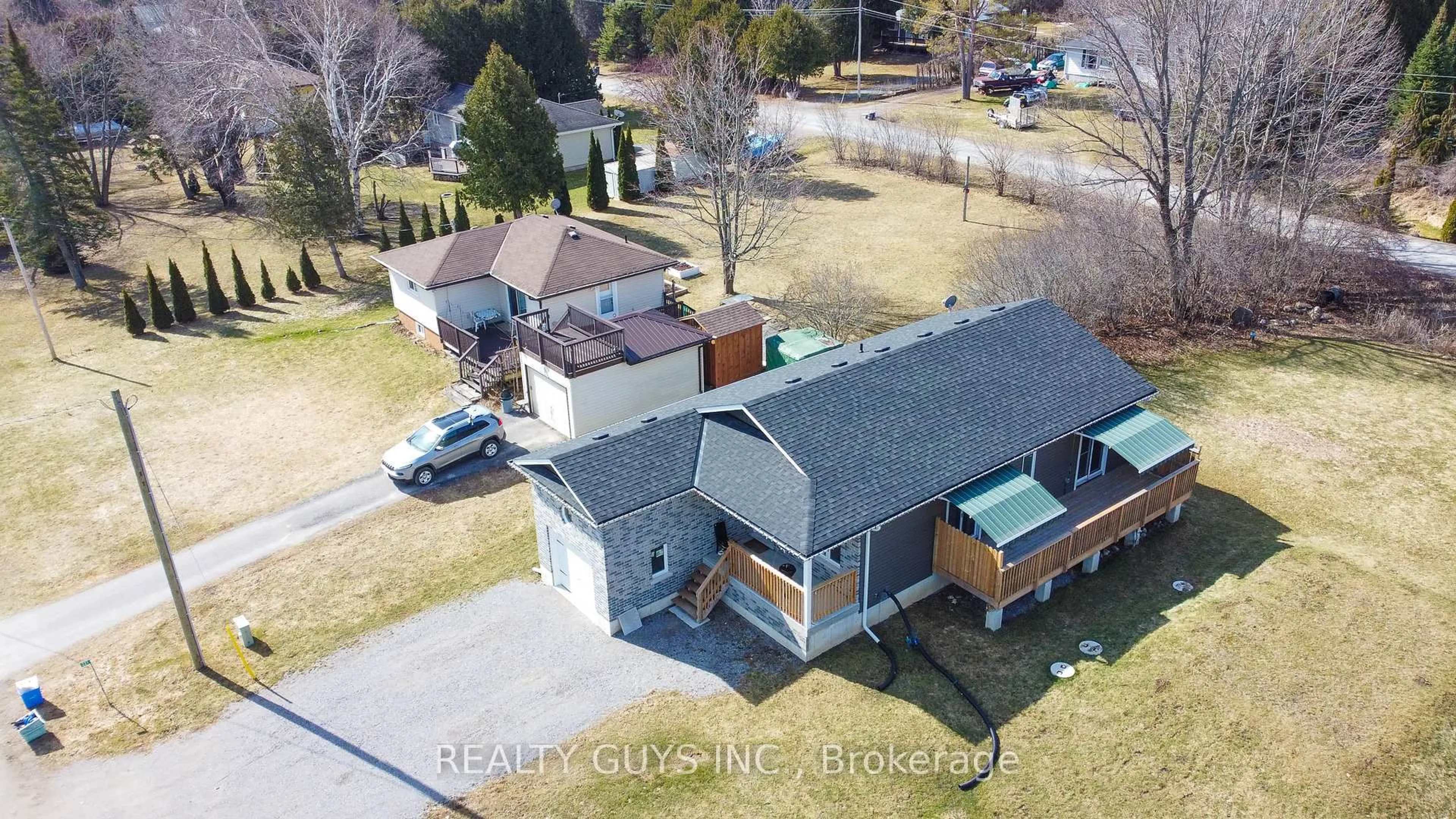 A pic from outside/outdoor area/front of a property/back of a property/a pic from drone, unknown for 223 Crosby Dr, Kawartha Lakes Ontario K0M 1A0