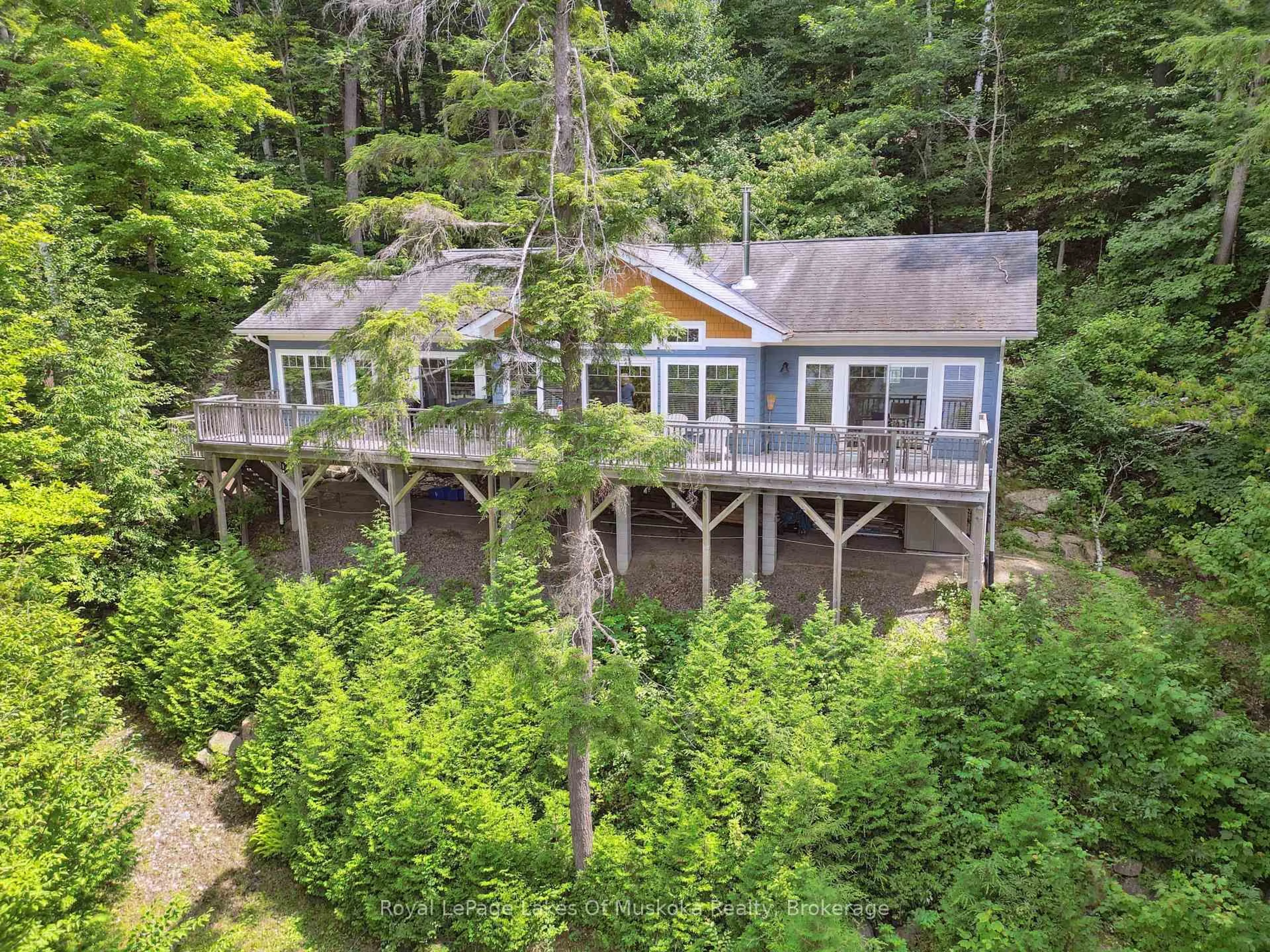 A pic from outside/outdoor area/front of a property/back of a property/a pic from drone, water/lake/river/ocean view for 16368 Kawagama-Dennison Island, Dysart et al Ontario K0M 1S0