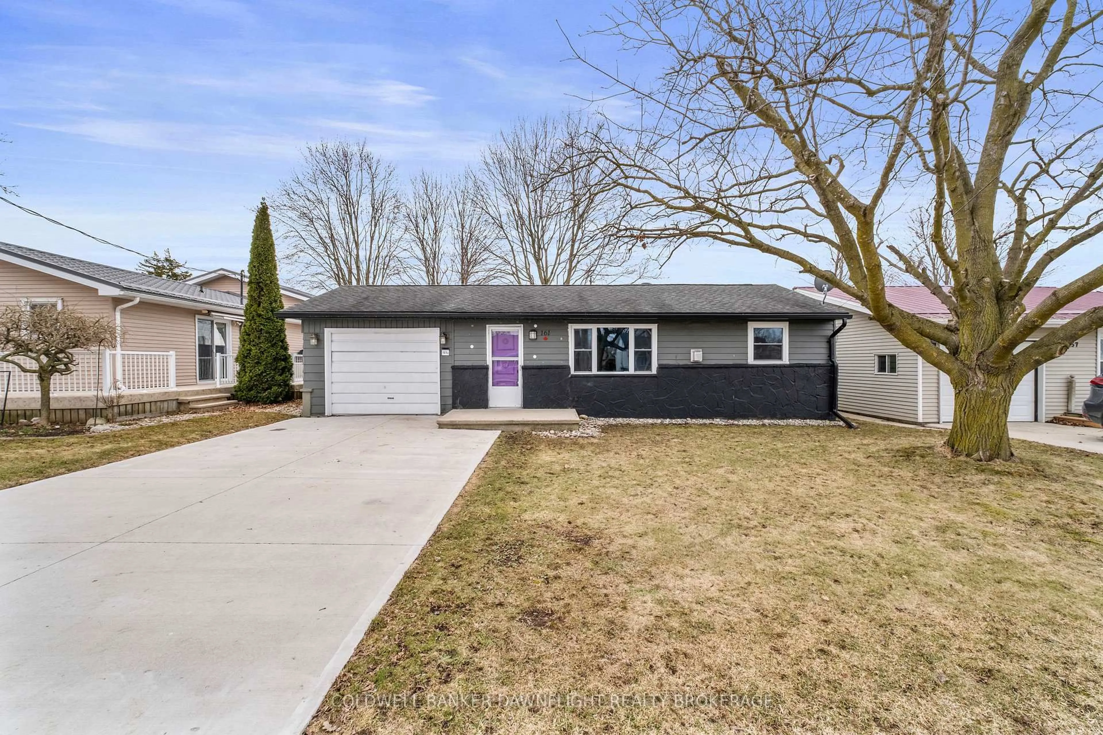 Home with vinyl exterior material, street for 161 HURON St, South Huron Ontario N0M 1S1