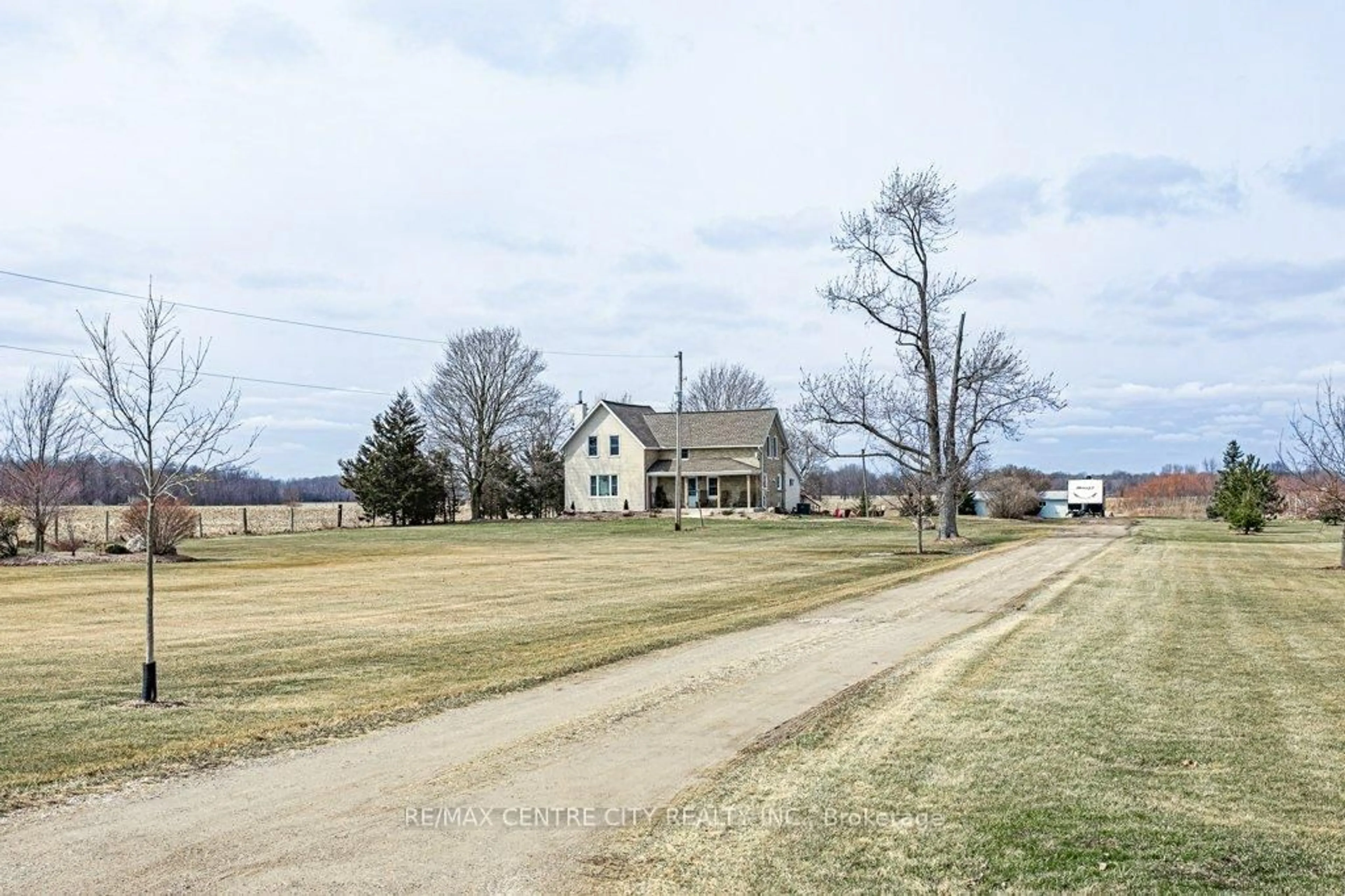 A pic from outside/outdoor area/front of a property/back of a property/a pic from drone, street for 26588 Carroll Line, West Elgin Ontario N0L 2P0