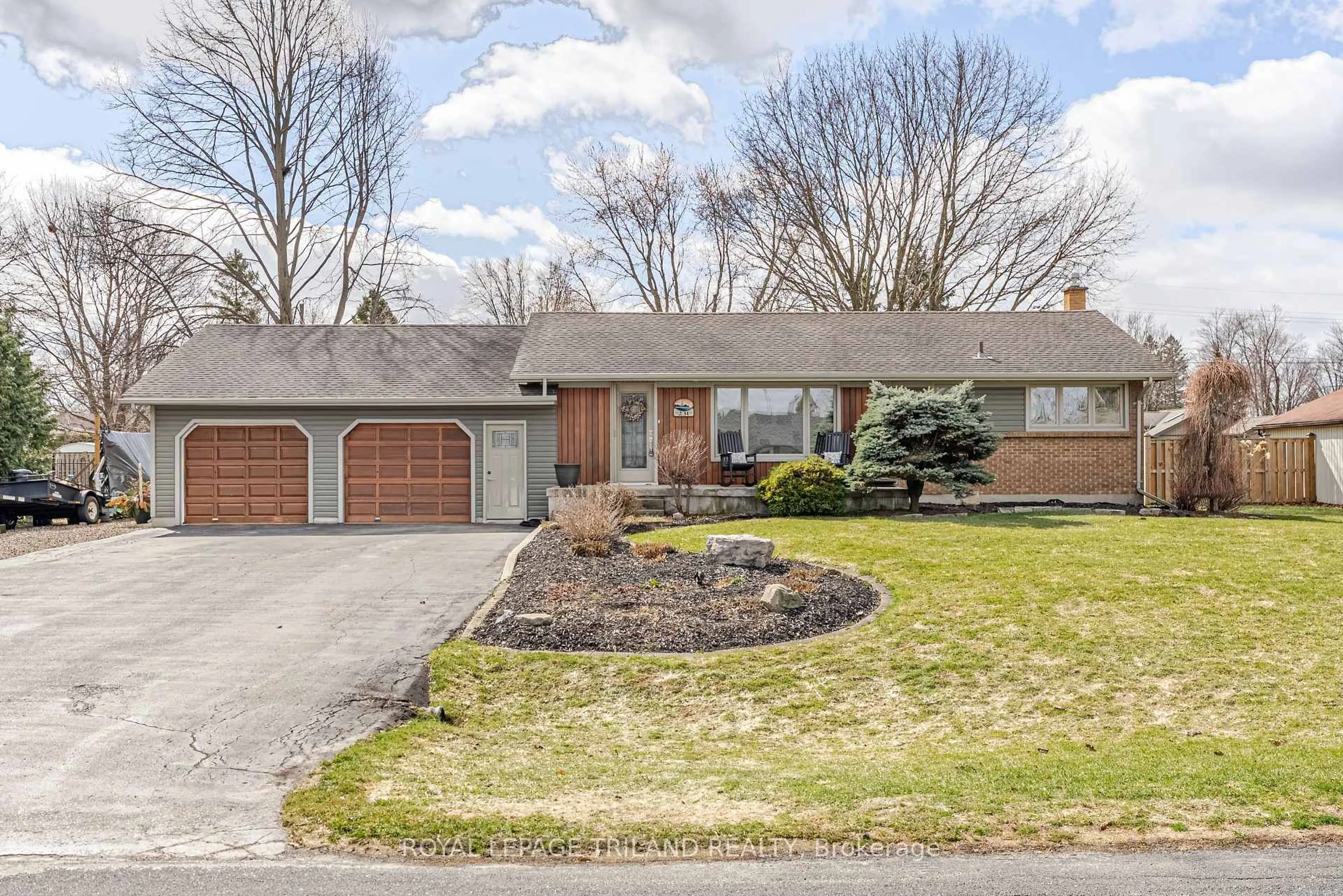 Home with brick exterior material, street for 231 Thames Cres, Thames Centre Ontario N0L 1G0
