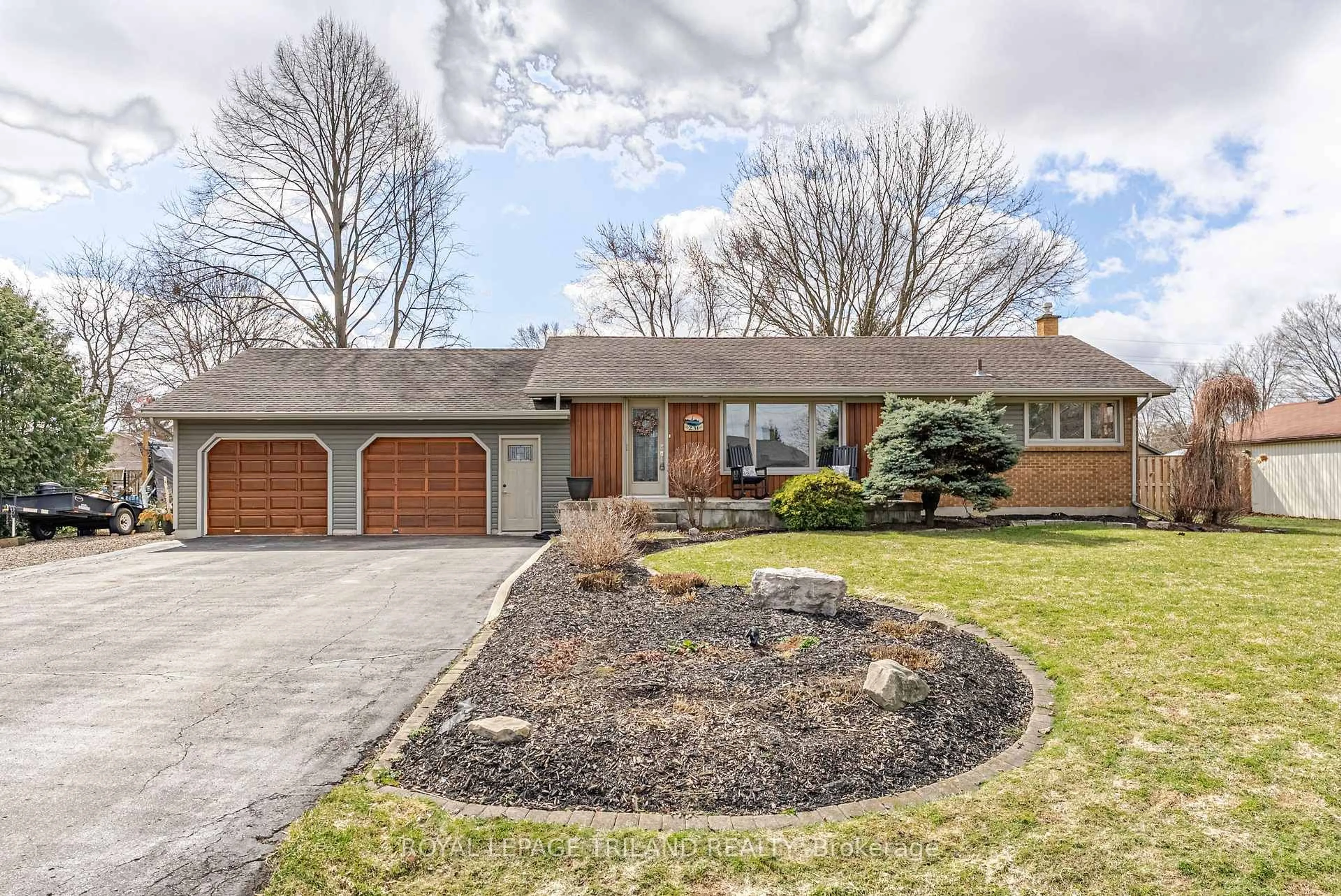 Home with brick exterior material, street for 231 Thames Cres, Thames Centre Ontario N0L 1G0