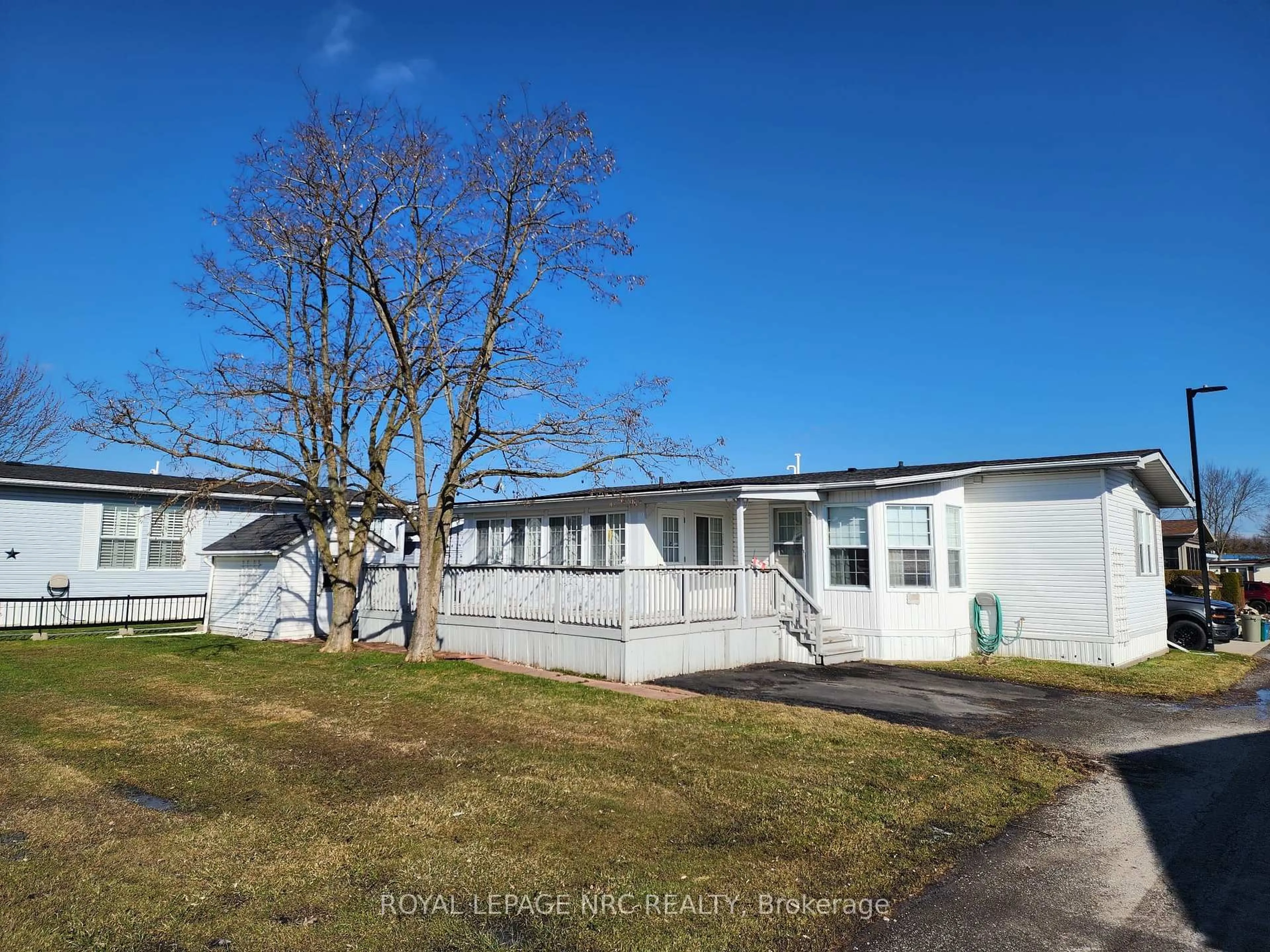 A pic from outside/outdoor area/front of a property/back of a property/a pic from drone, street for 3033 Townline Rd #233, Fort Erie Ontario L0S 1S1