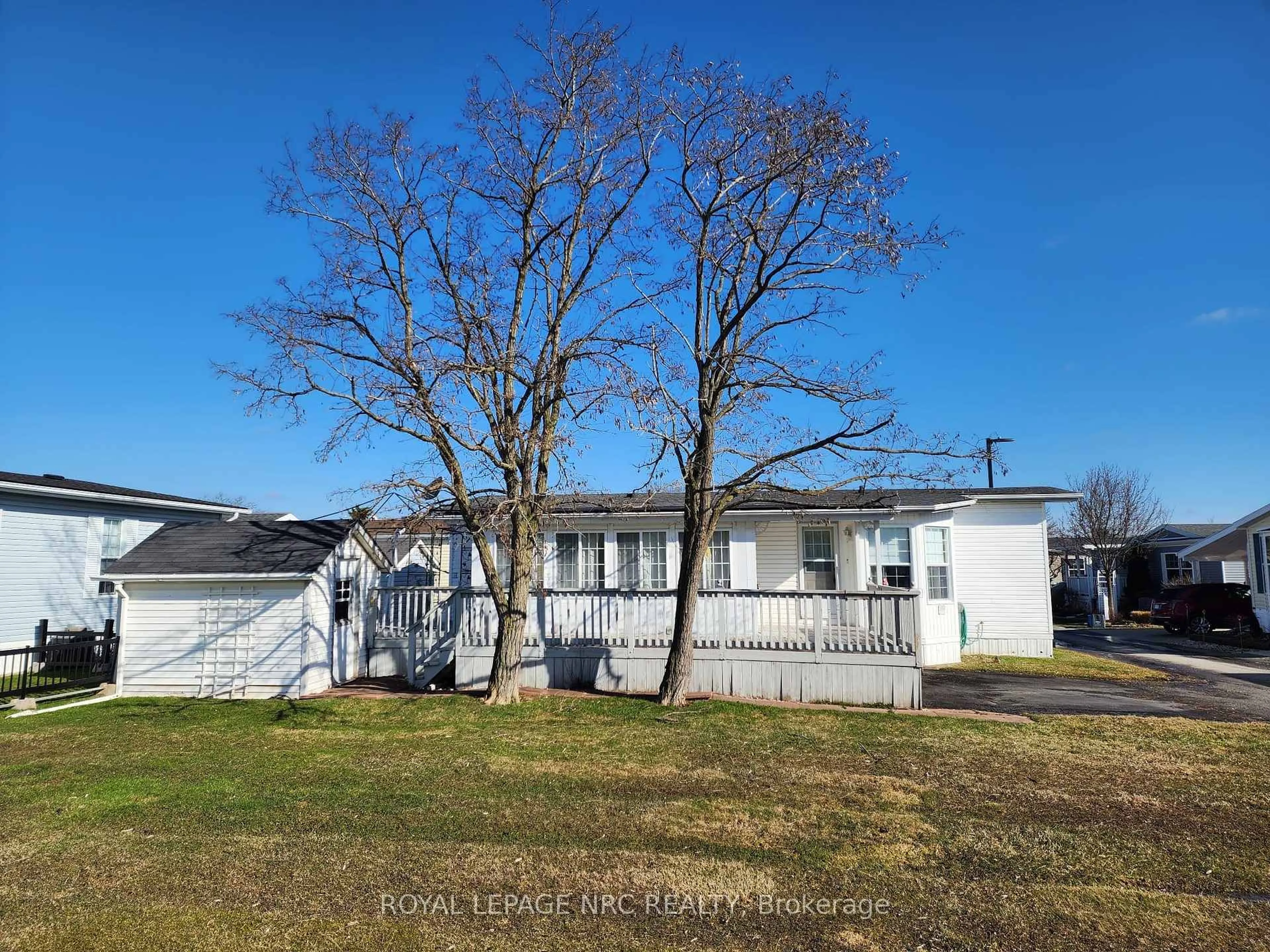 A pic from outside/outdoor area/front of a property/back of a property/a pic from drone, street for 3033 Townline Rd #233, Fort Erie Ontario L0S 1S1