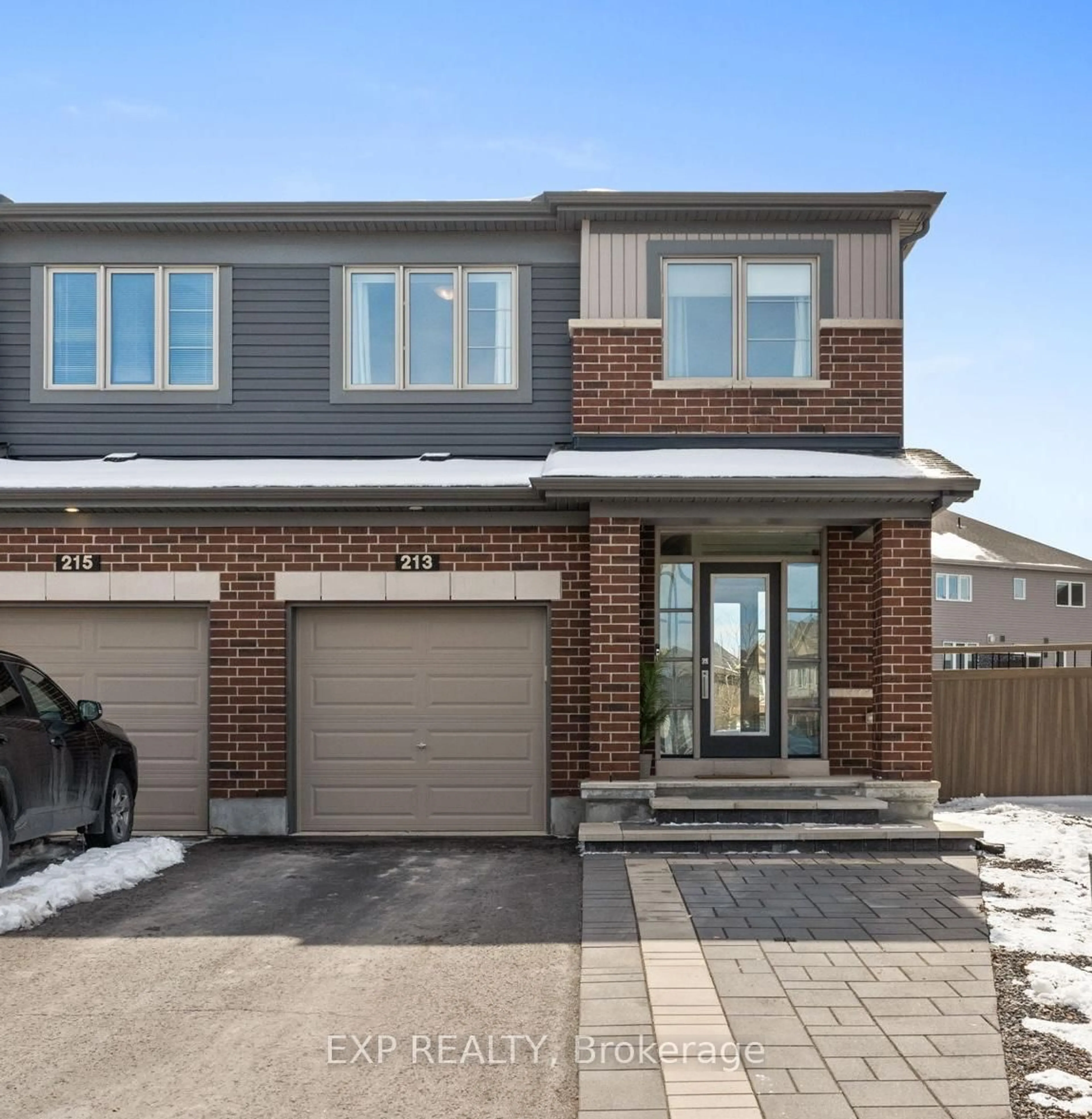 Home with brick exterior material, street for 213 Belleek Lane, Ottawa Ontario K2J 6G2