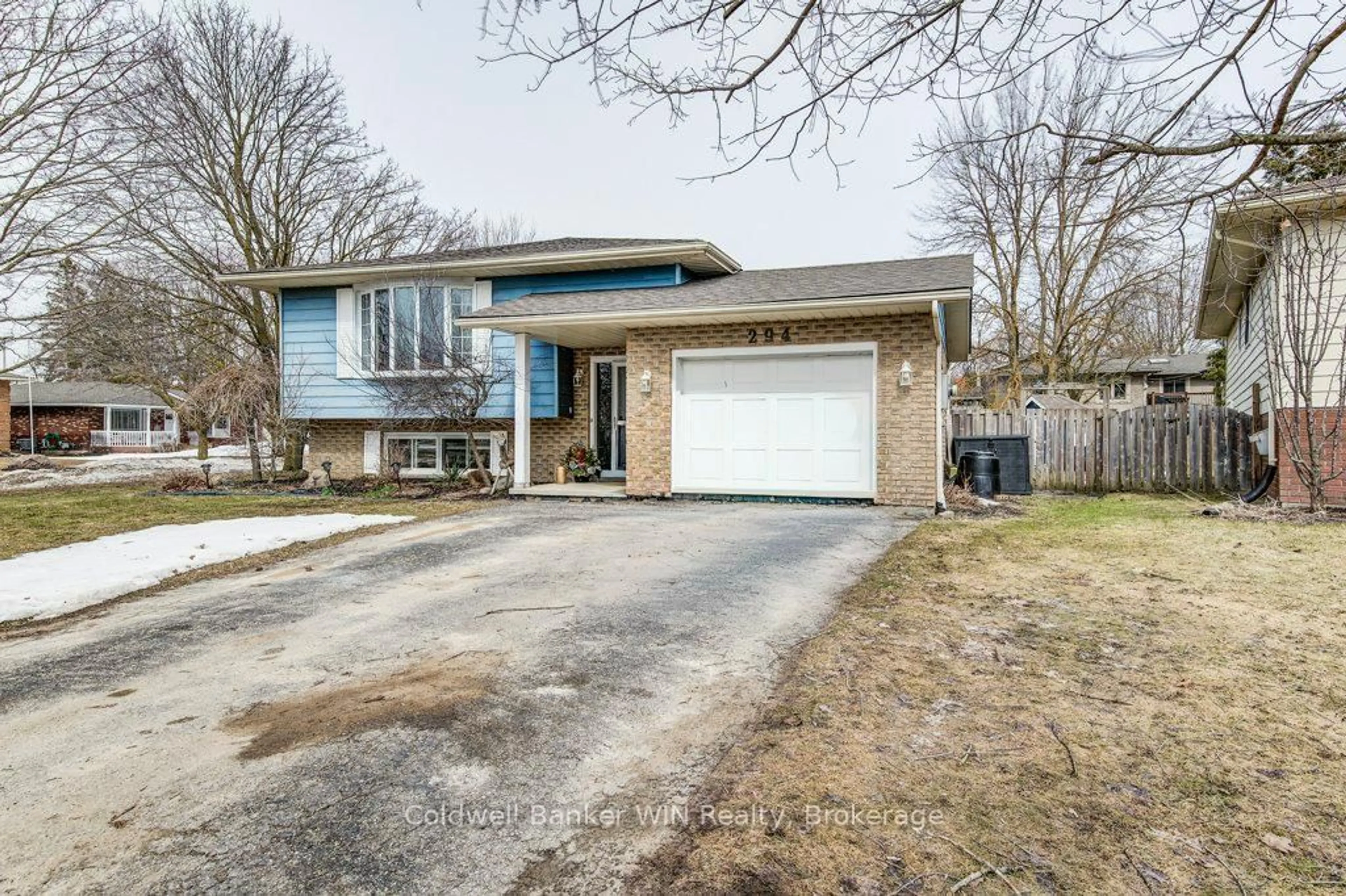 Home with brick exterior material, street for 294 Forest Glen Dr, Wellington North Ontario N0G 2L2