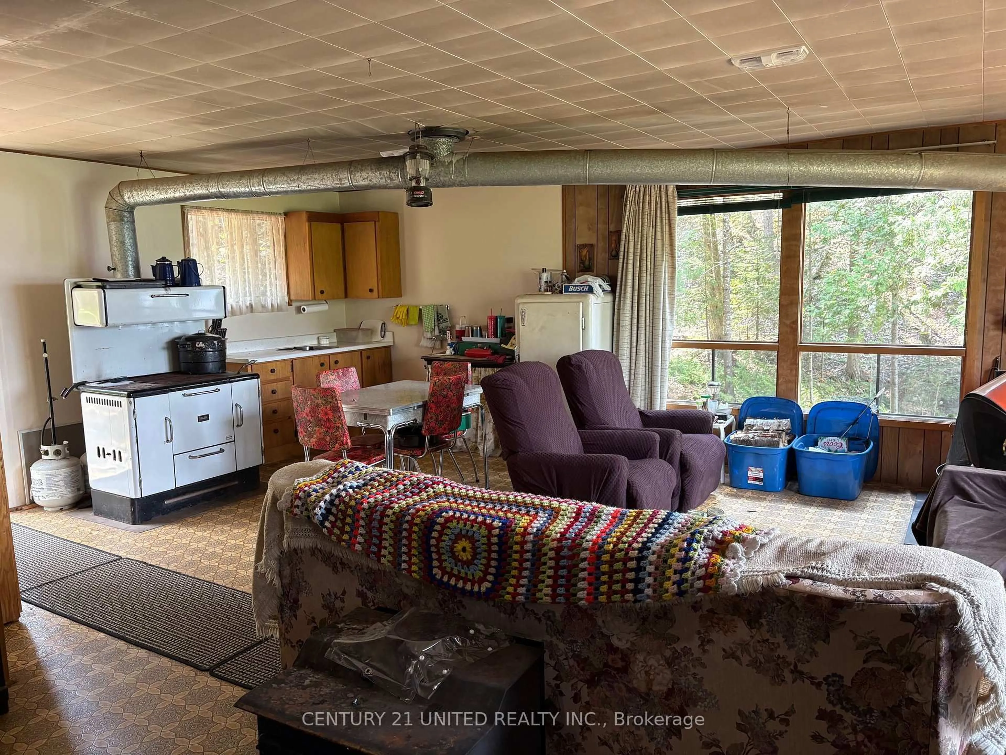 Living room with furniture, unknown for 16 Fire Route 311, Trent Lakes Ontario K0L 1J0