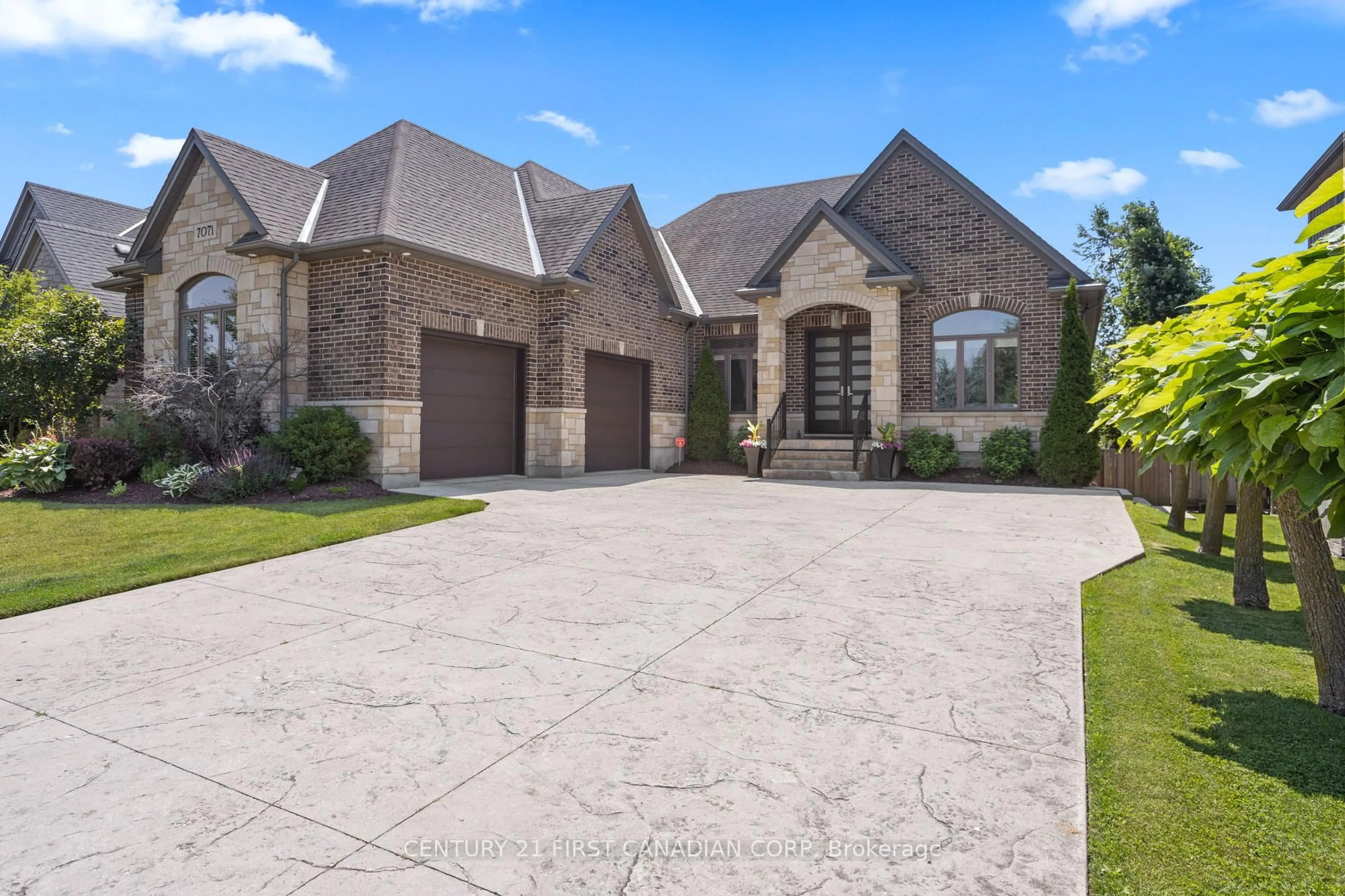 Home with brick exterior material, street for 7071 Clayton Walk, London South Ontario N6P 0A1