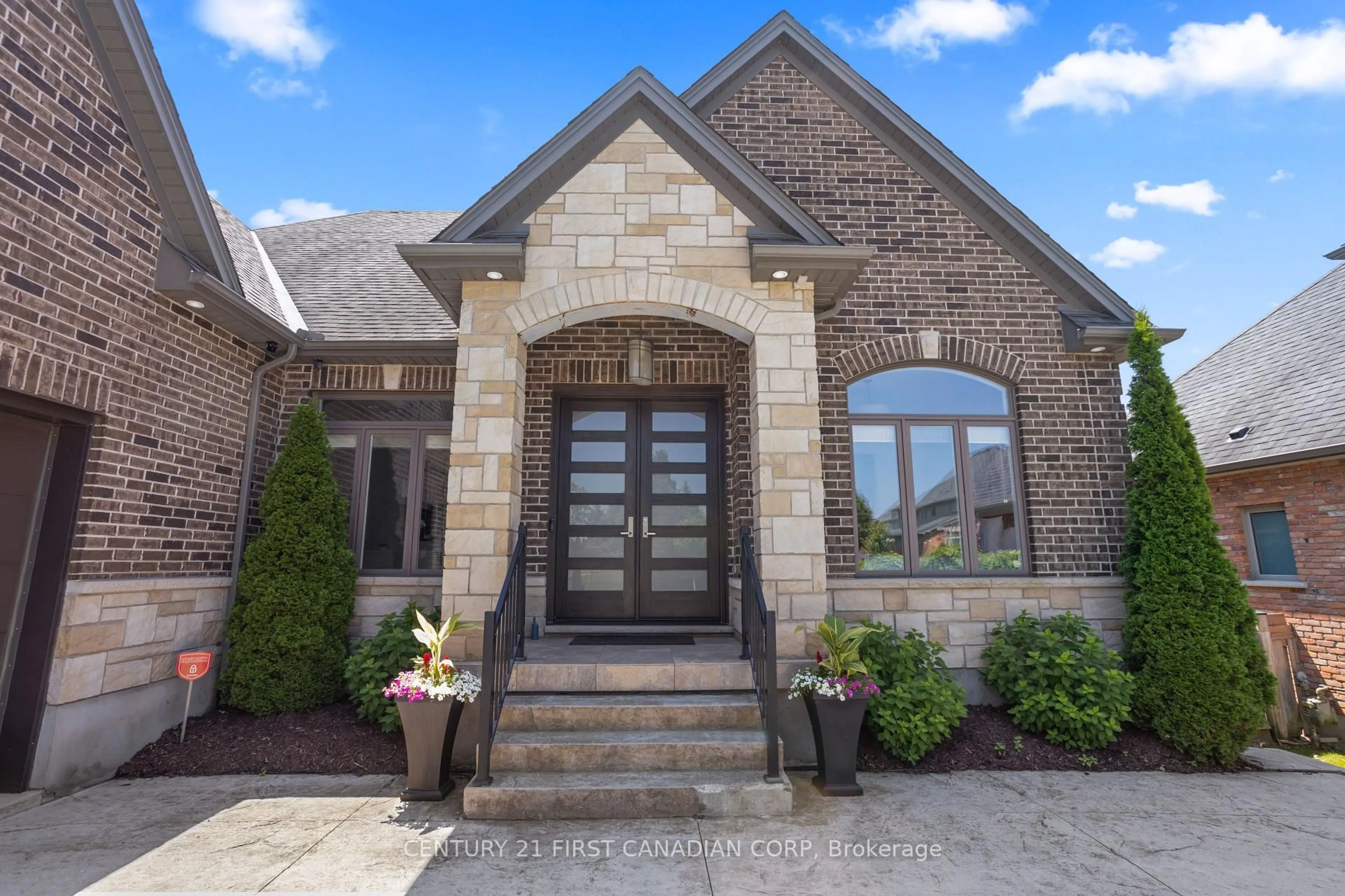 Home with brick exterior material, street for 7071 Clayton Walk, London South Ontario N6P 0A1