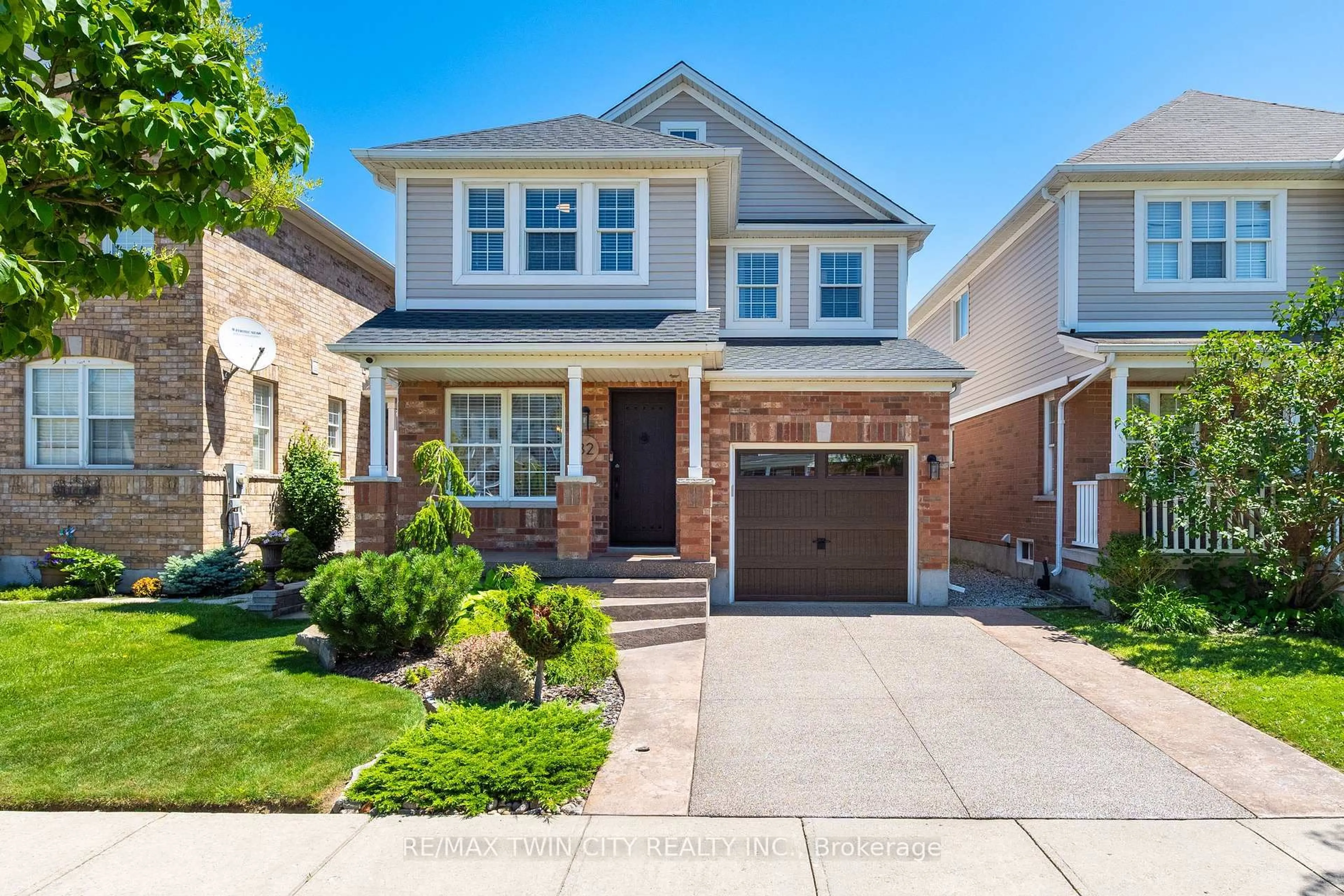 Home with brick exterior material, street for 32 Bloomington Dr, Cambridge Ontario N1P 1J4