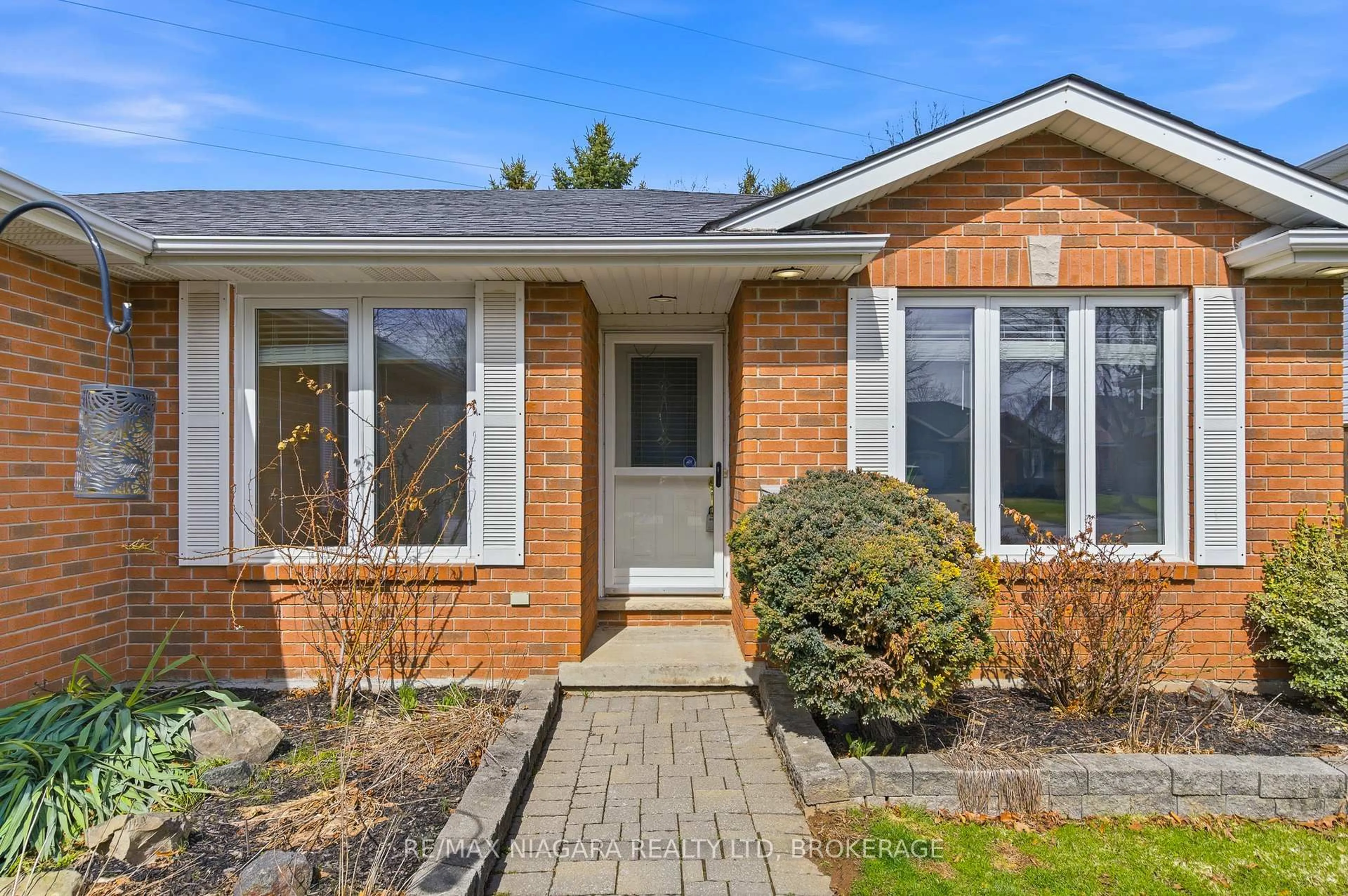 Home with brick exterior material, street for 7865 Bishop Ave, Niagara Falls Ontario L2H 3C6