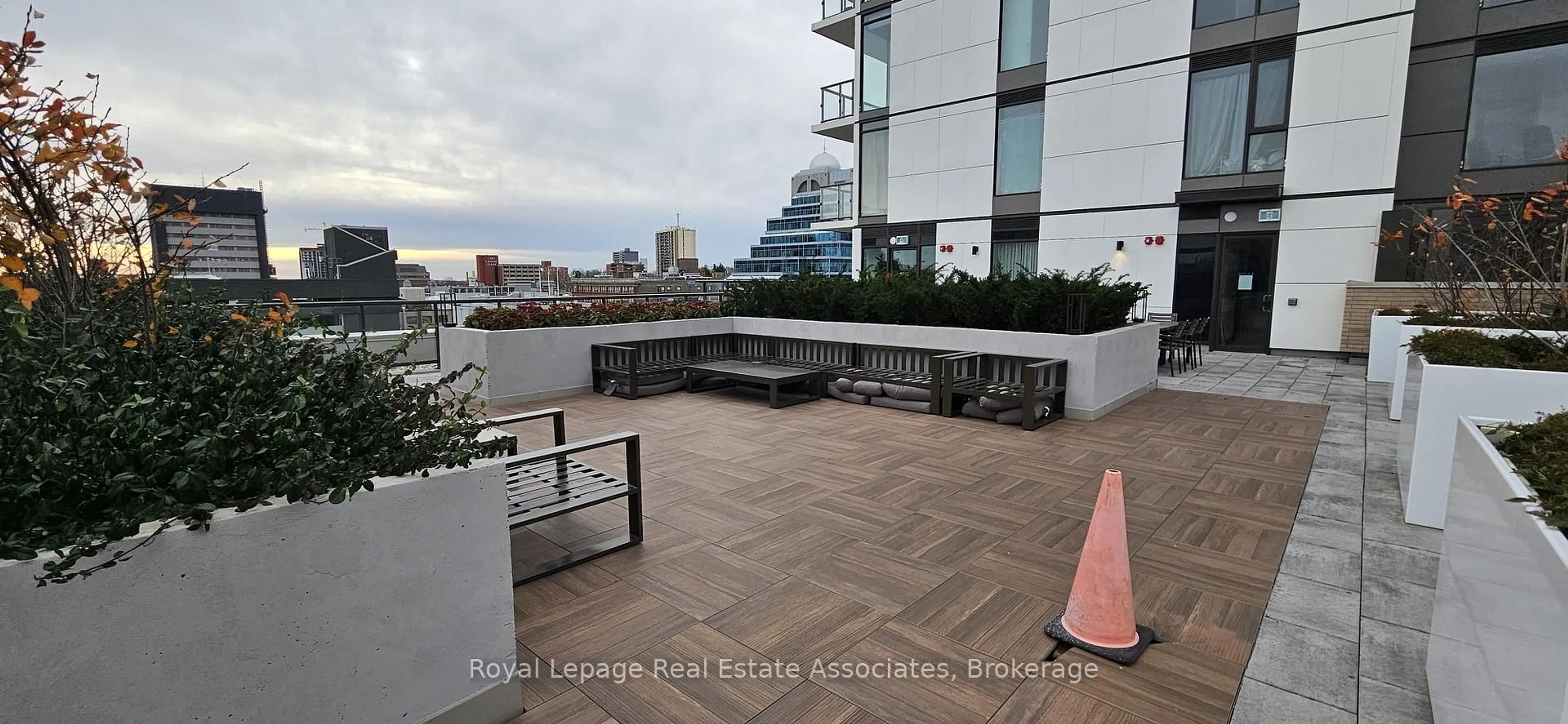 A pic from outside/outdoor area/front of a property/back of a property/a pic from drone, city buildings view from balcony for 55 Duke St #409, Kitchener Ontario N2H 0C9