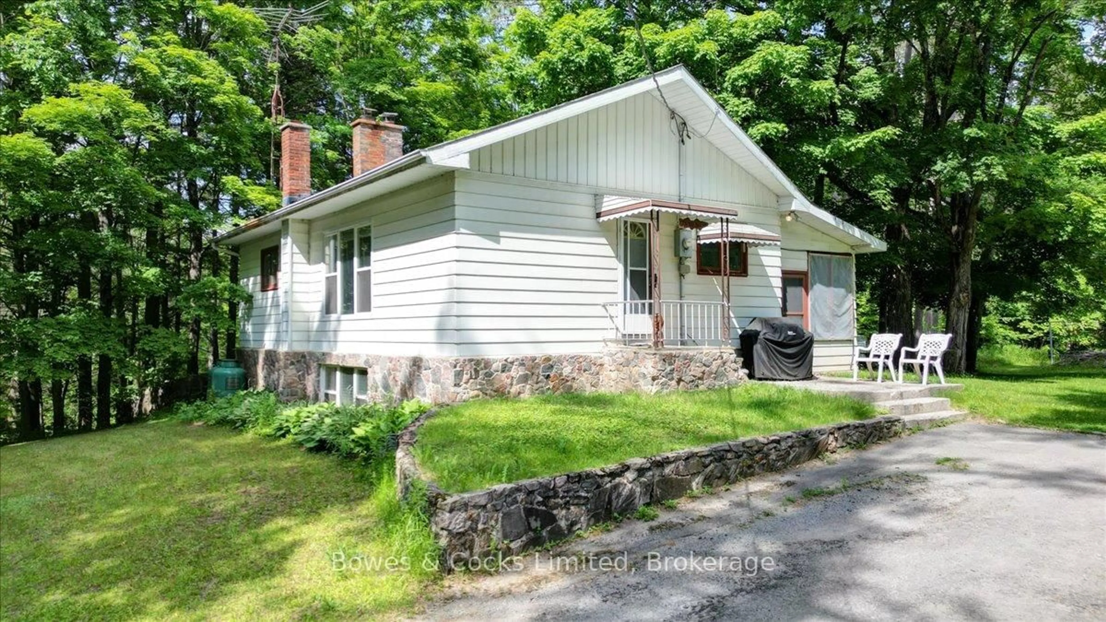 Home with vinyl exterior material, street for 49 McFadden Rd, North Kawartha Ontario K0L 1A0