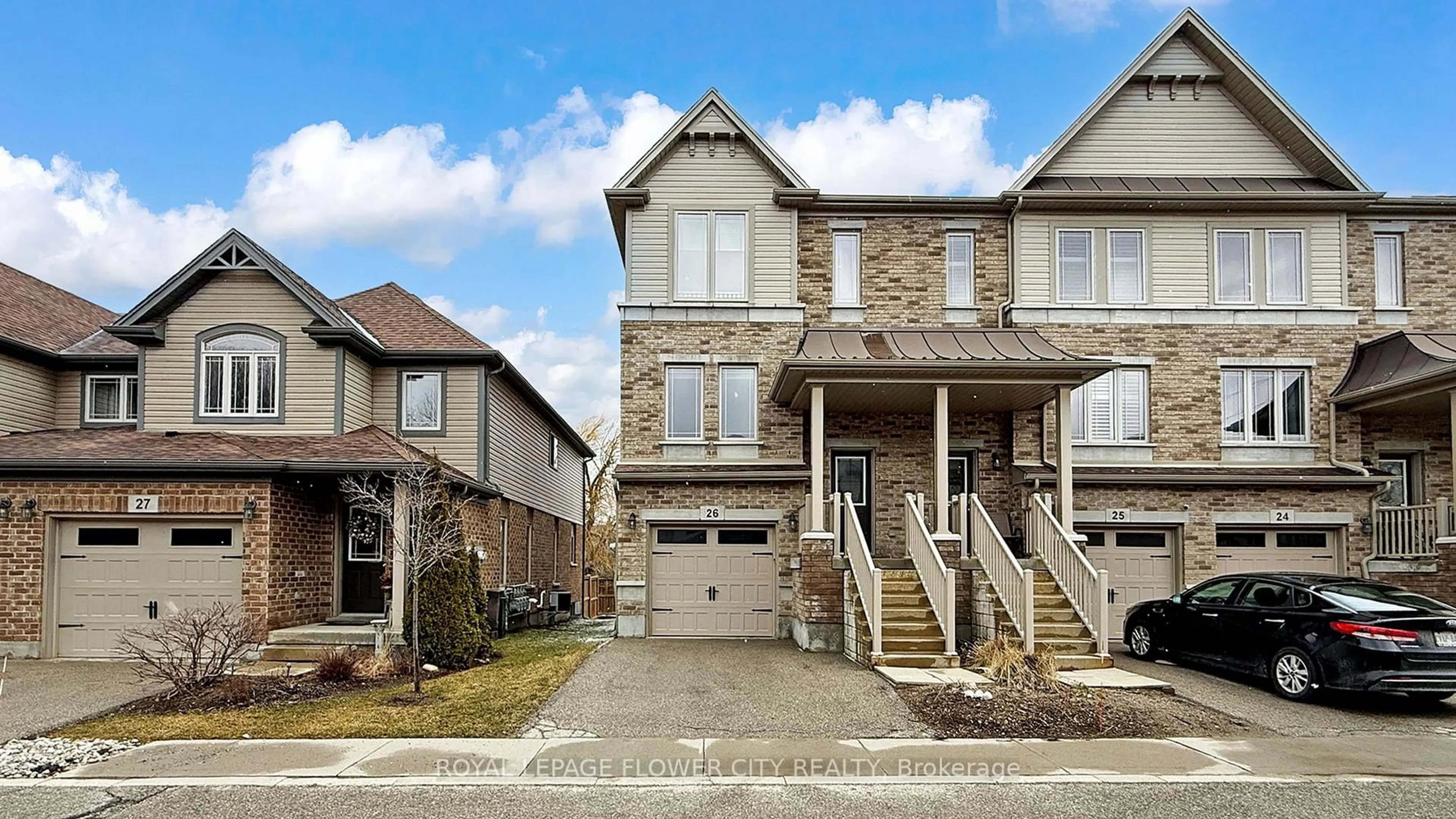 Home with brick exterior material, street for 66 Eastview Rd #26, Guelph Ontario N1E 0N1