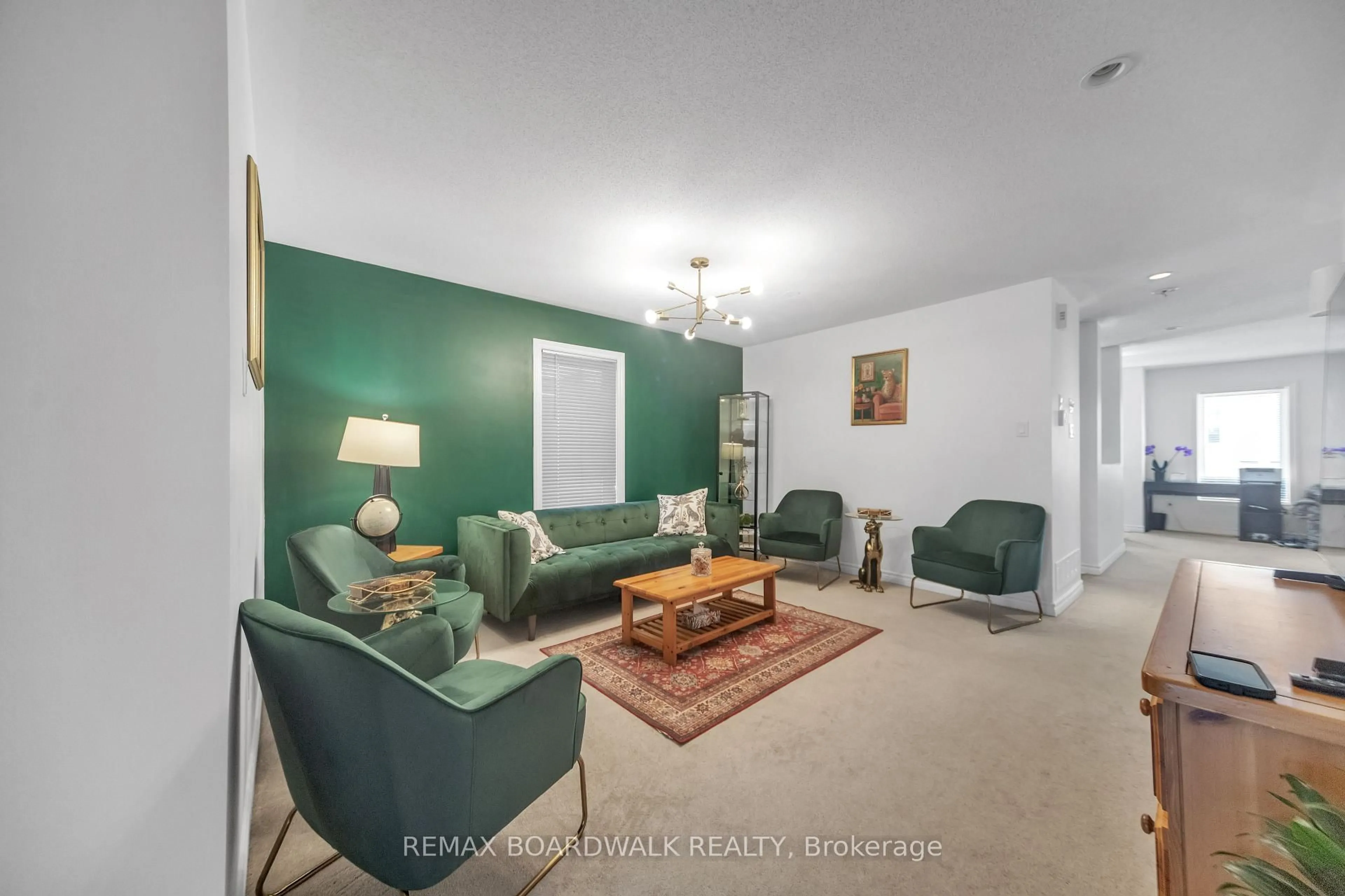 Living room with furniture, unknown for 604 Paul Metivier Dr, Ottawa Ontario K2J 0X9