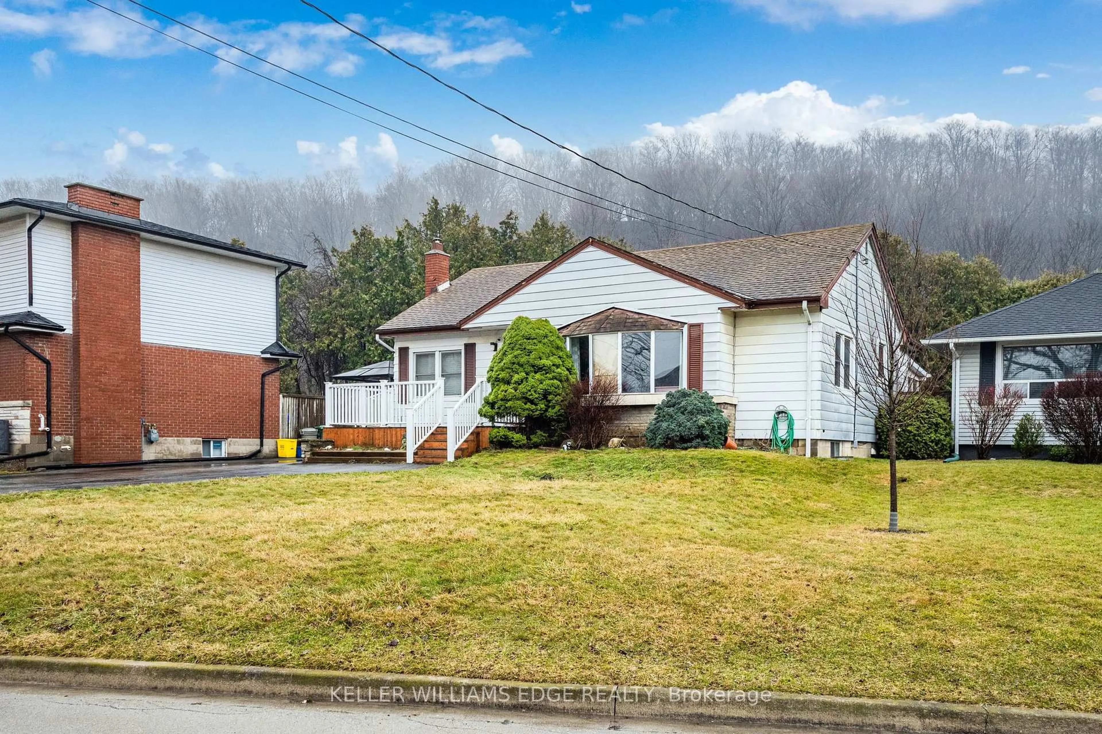 Home with vinyl exterior material, street for 13 Alba St, Hamilton Ontario L8G 1N9