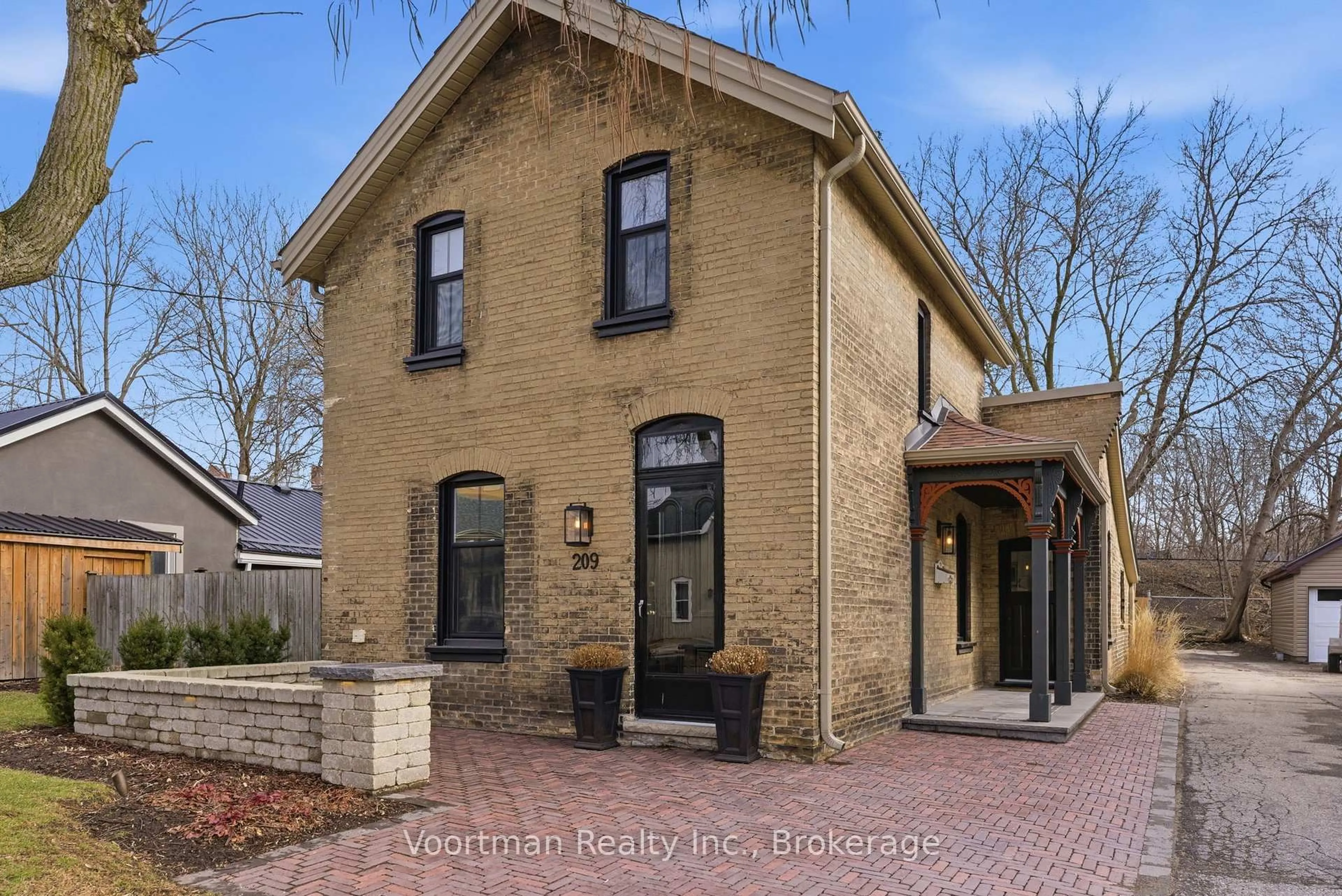 Home with brick exterior material, street for 209 William St, Brantford Ontario N3T 3L6