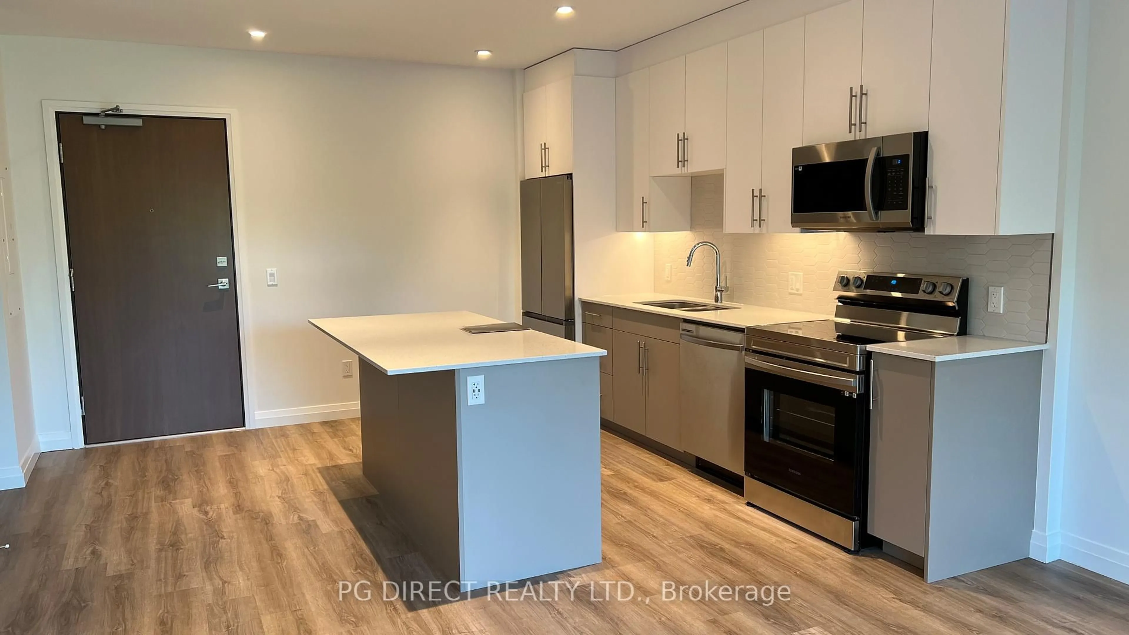 Open concept kitchen, wood/laminate floor for 525 New Dundee Rd #413, Kitchener Ontario N2P 0K8