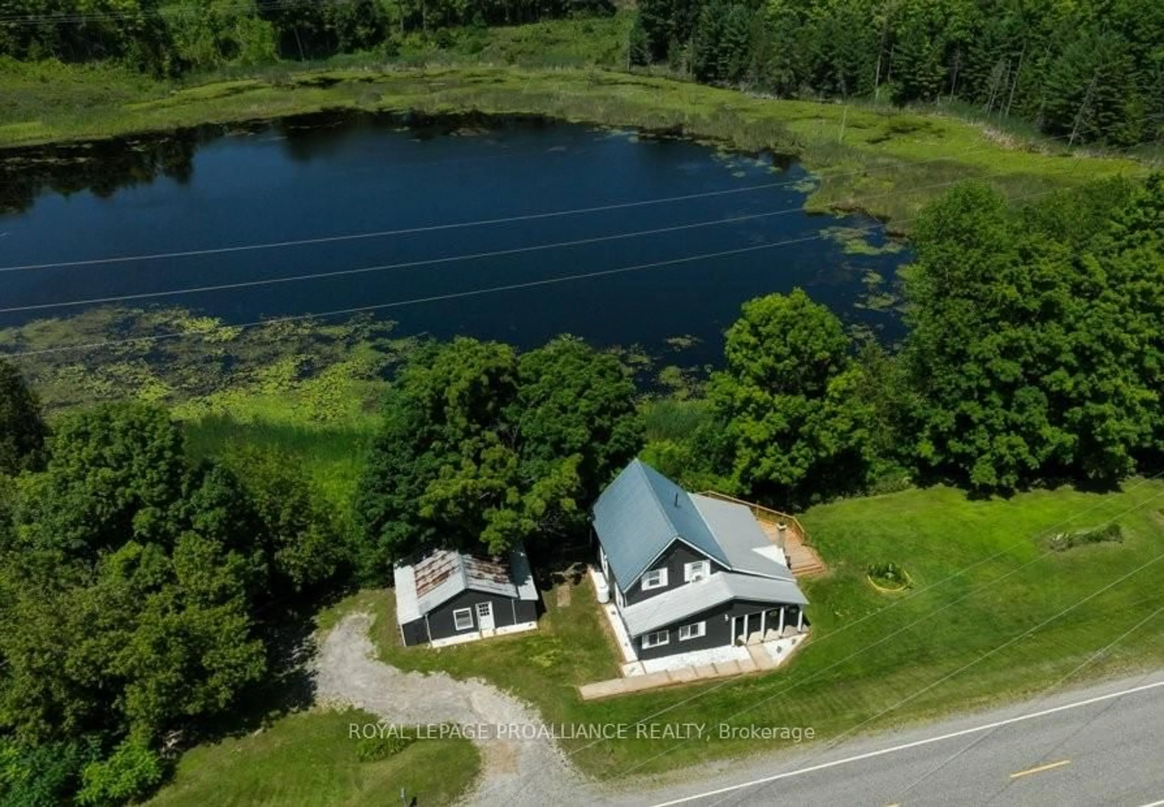 A pic from outside/outdoor area/front of a property/back of a property/a pic from drone, water/lake/river/ocean view for 4893 Road 506 Rd, Cloyne Ontario K0H 1K0