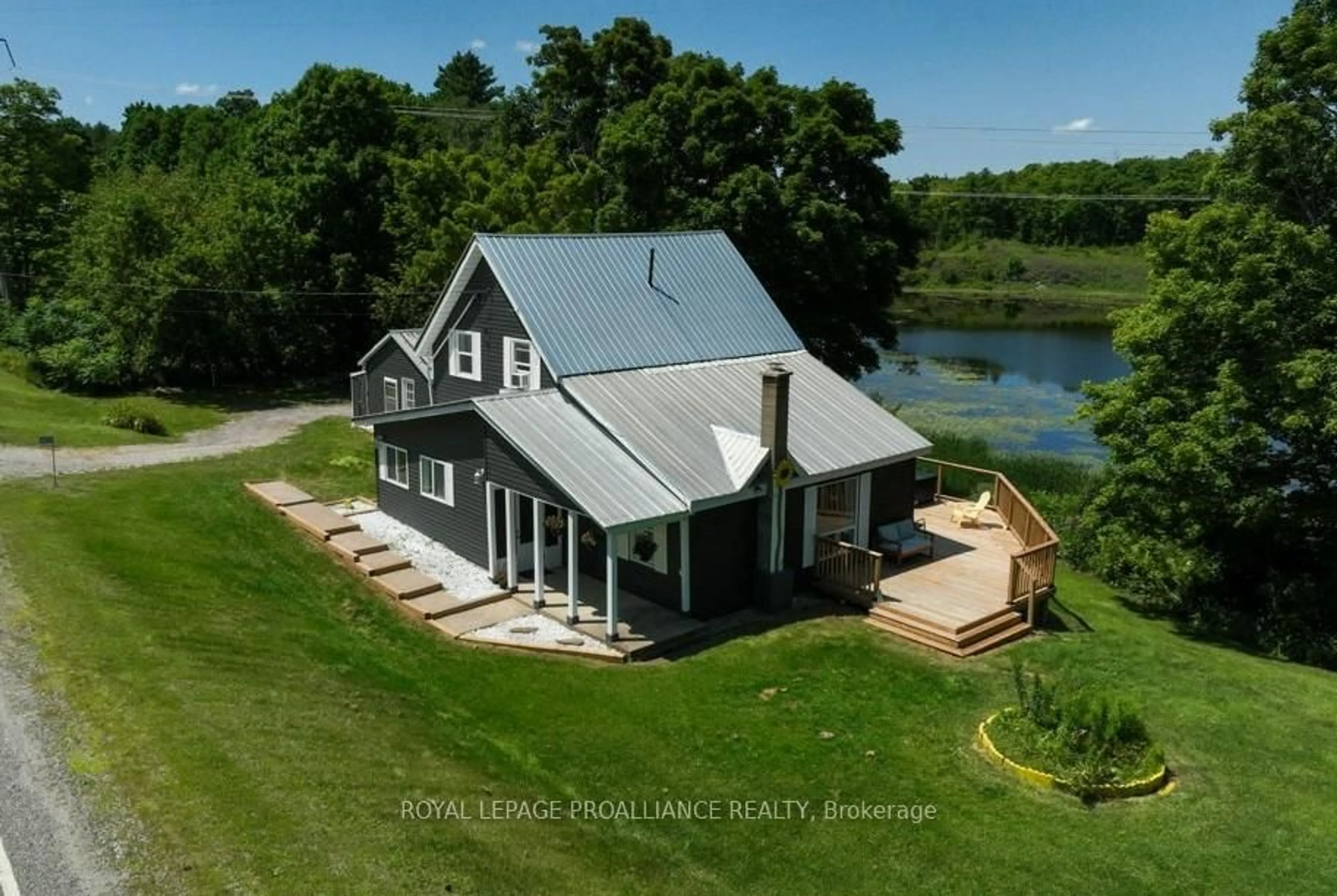 A pic from outside/outdoor area/front of a property/back of a property/a pic from drone, water/lake/river/ocean view for 4893 Road 506 Rd, Cloyne Ontario K0H 1K0