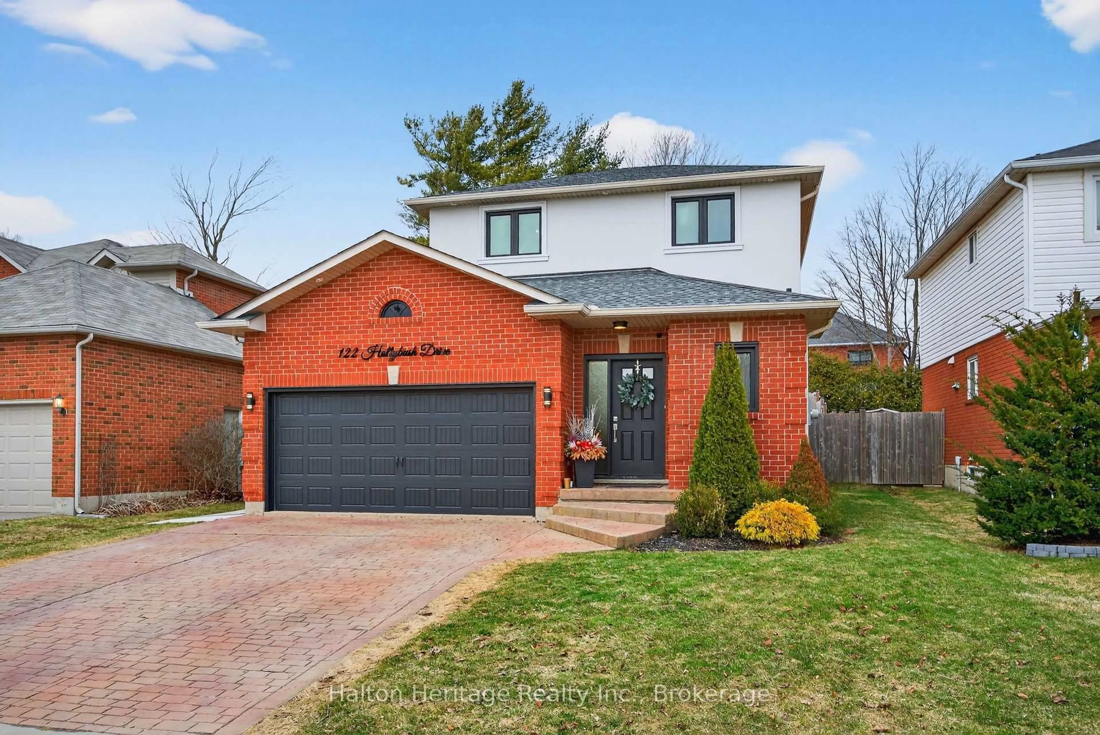 Home with brick exterior material, street for 122 Hollybush Dr, Hamilton Ontario L8B 0P1
