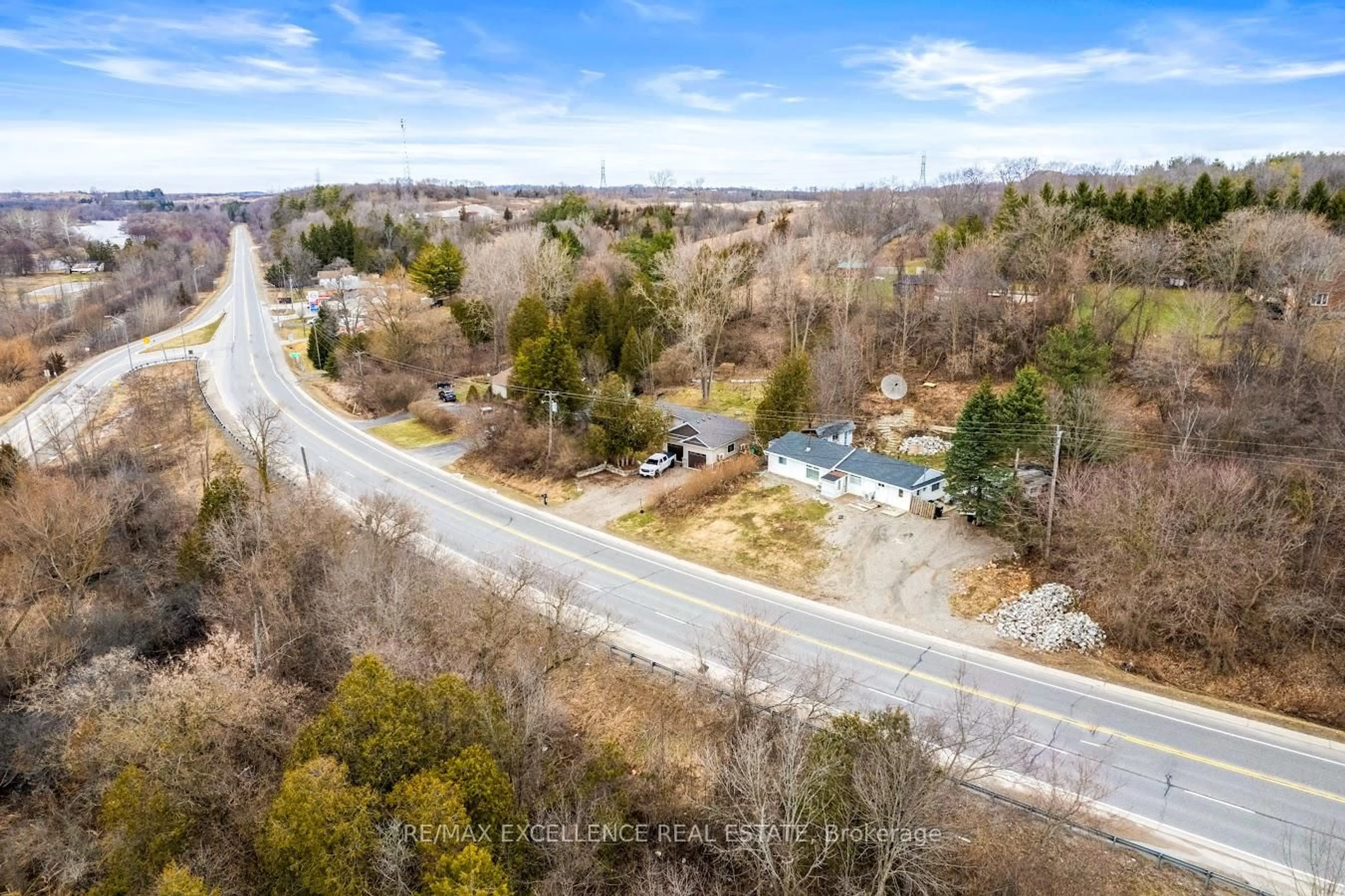 A pic from outside/outdoor area/front of a property/back of a property/a pic from drone, forest/trees view for 1867 Brantford Highway, North Dumfries Ontario N1R 5S6