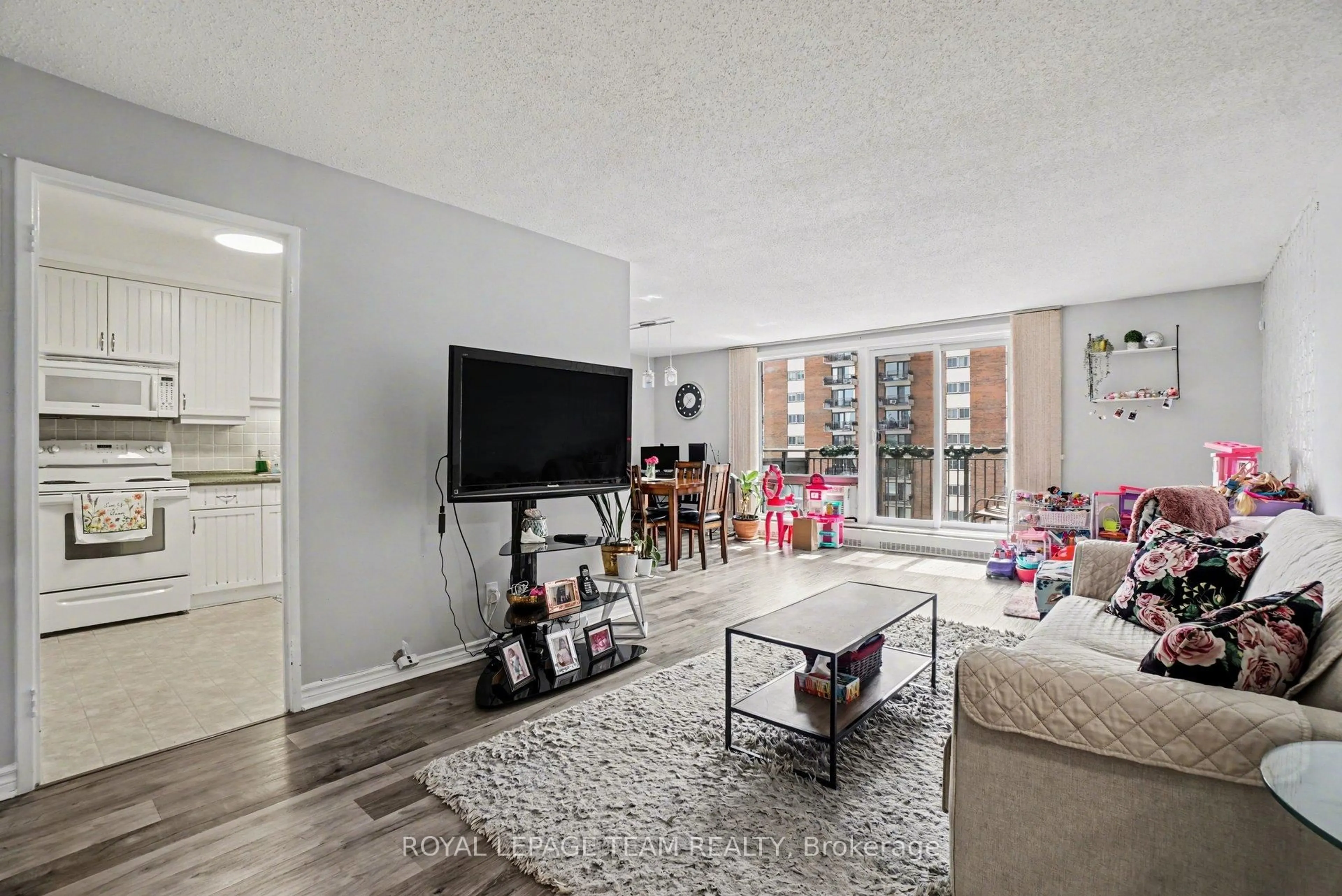 Living room with furniture, unknown for 1485 Baseline Rd #509, Ottawa Ontario K2C 3L8