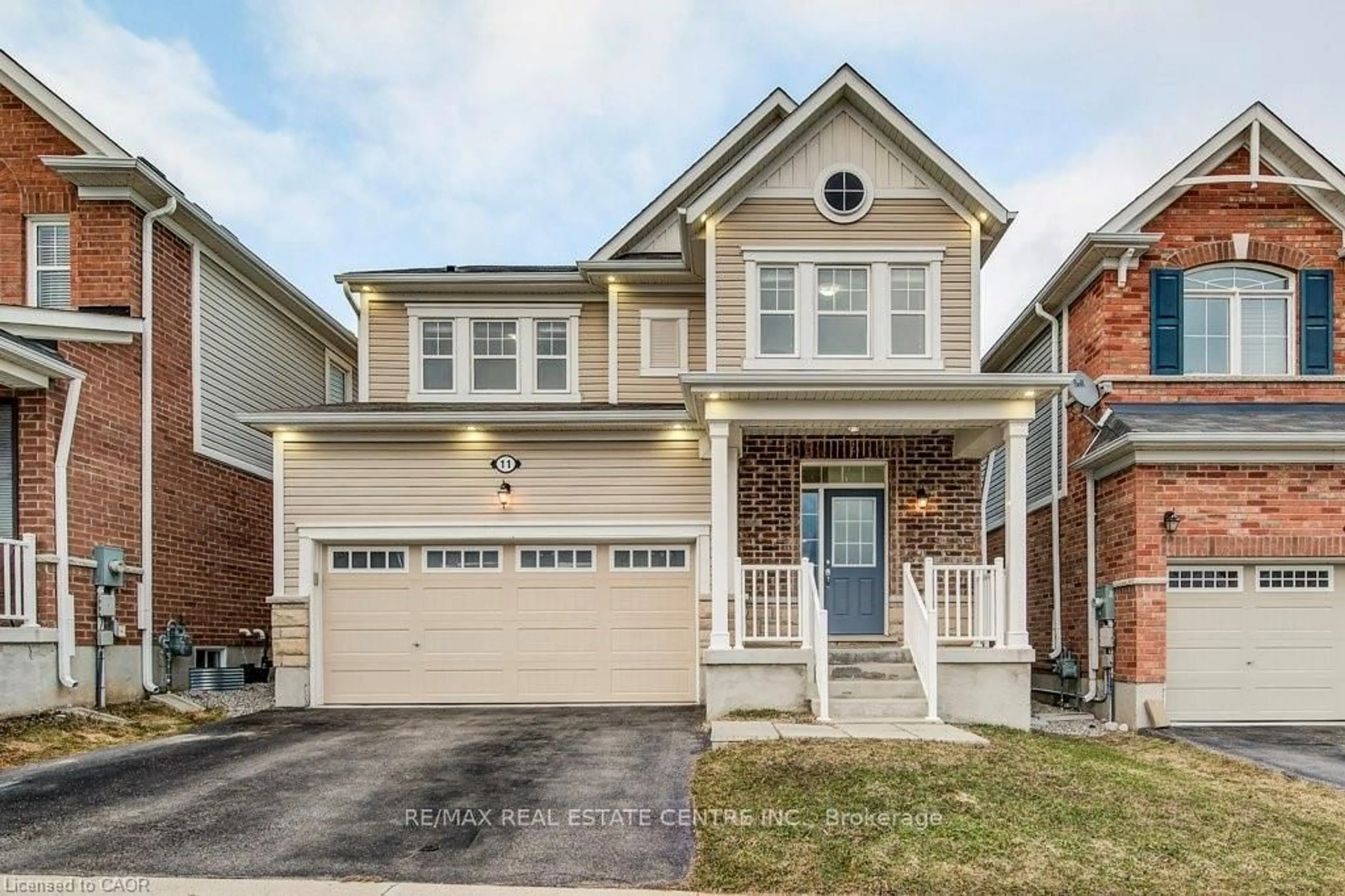 Home with brick exterior material, street for 11 Compass Tr, Cambridge Ontario N3E 0B7