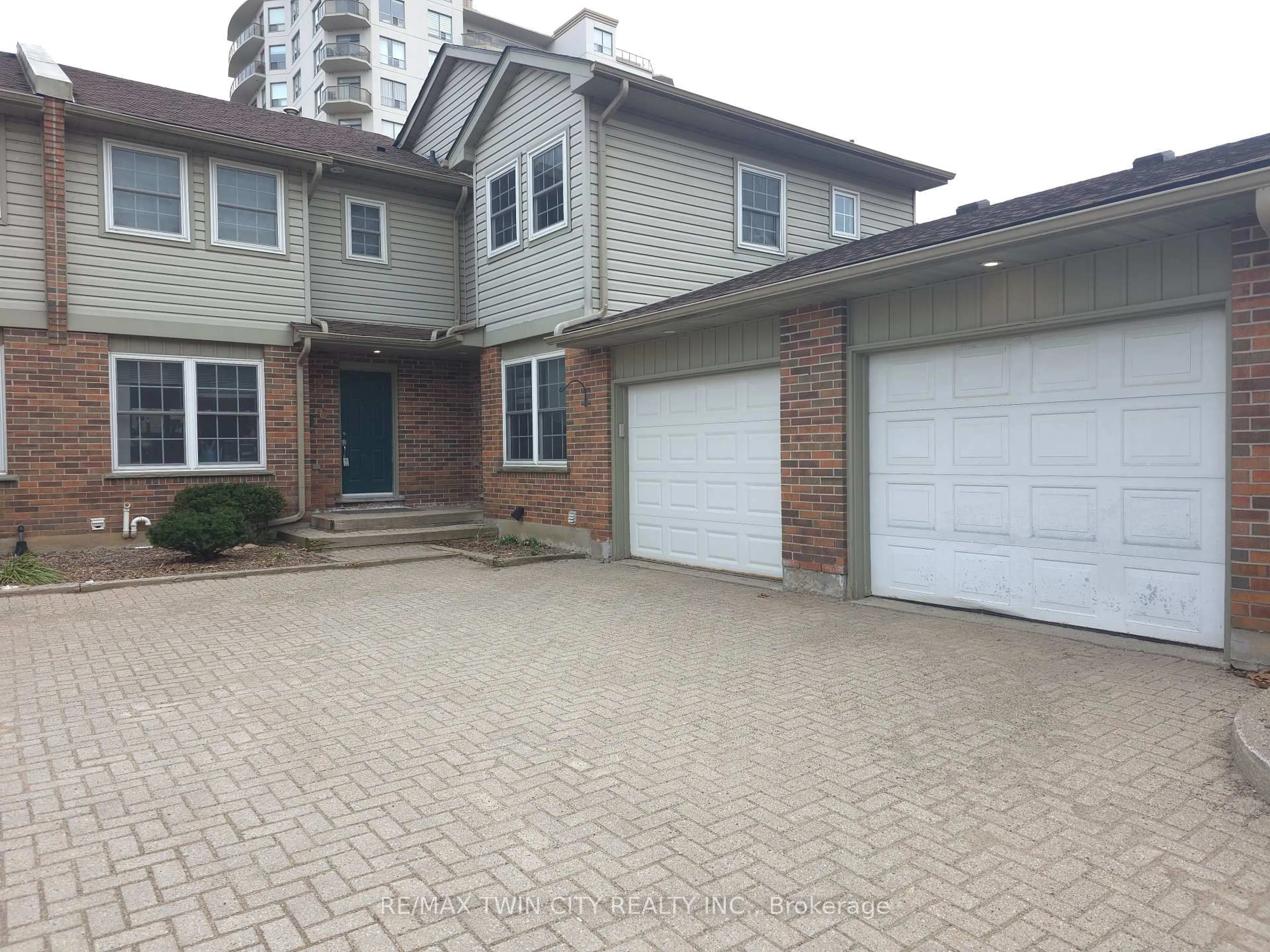 Home with brick exterior material, street for 250 Keats Way #6, Waterloo Ontario N2L 6J5