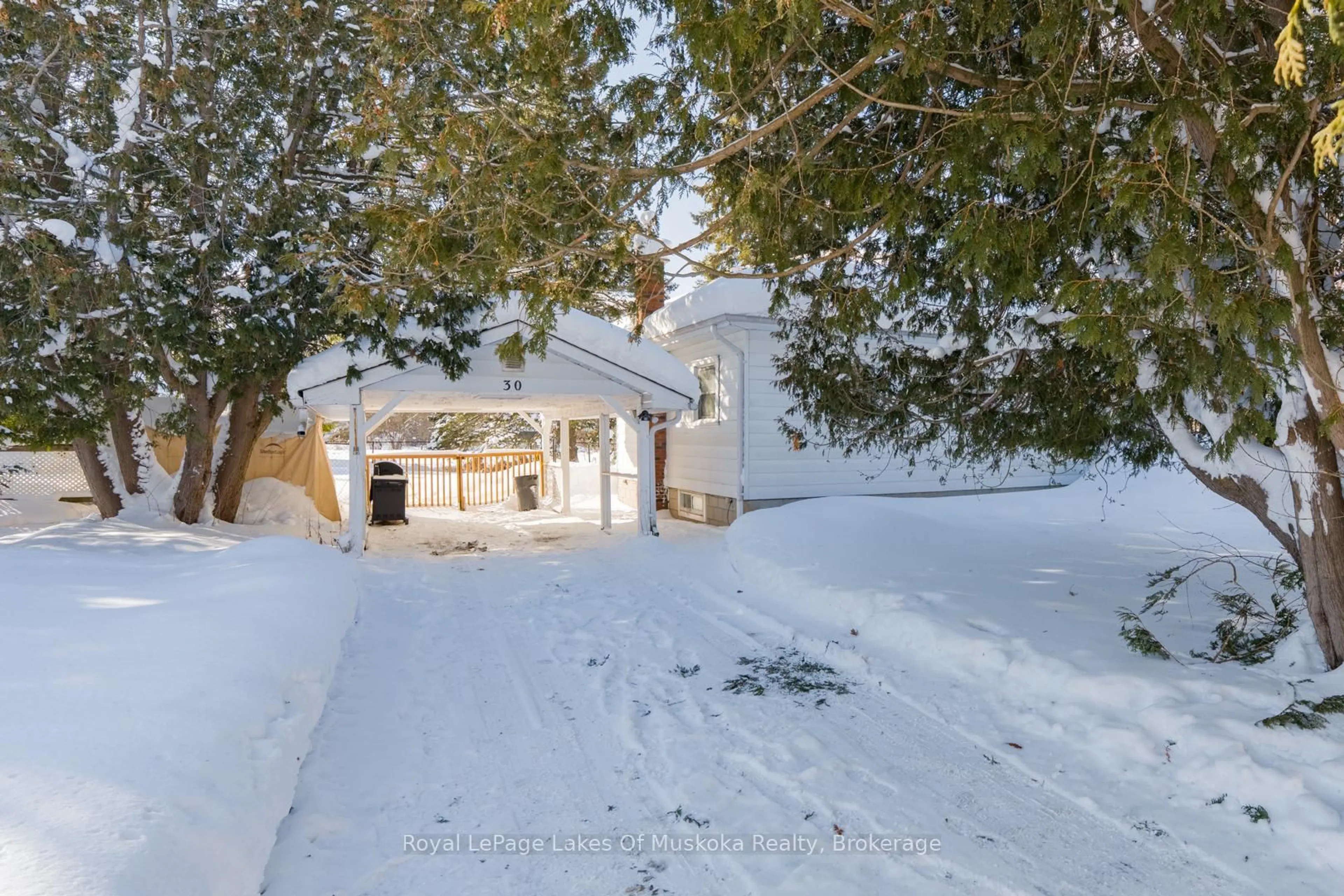 A pic from outside/outdoor area/front of a property/back of a property/a pic from drone, street for 30 Kitchen Rd, Huntsville Ontario P1H 1Y3