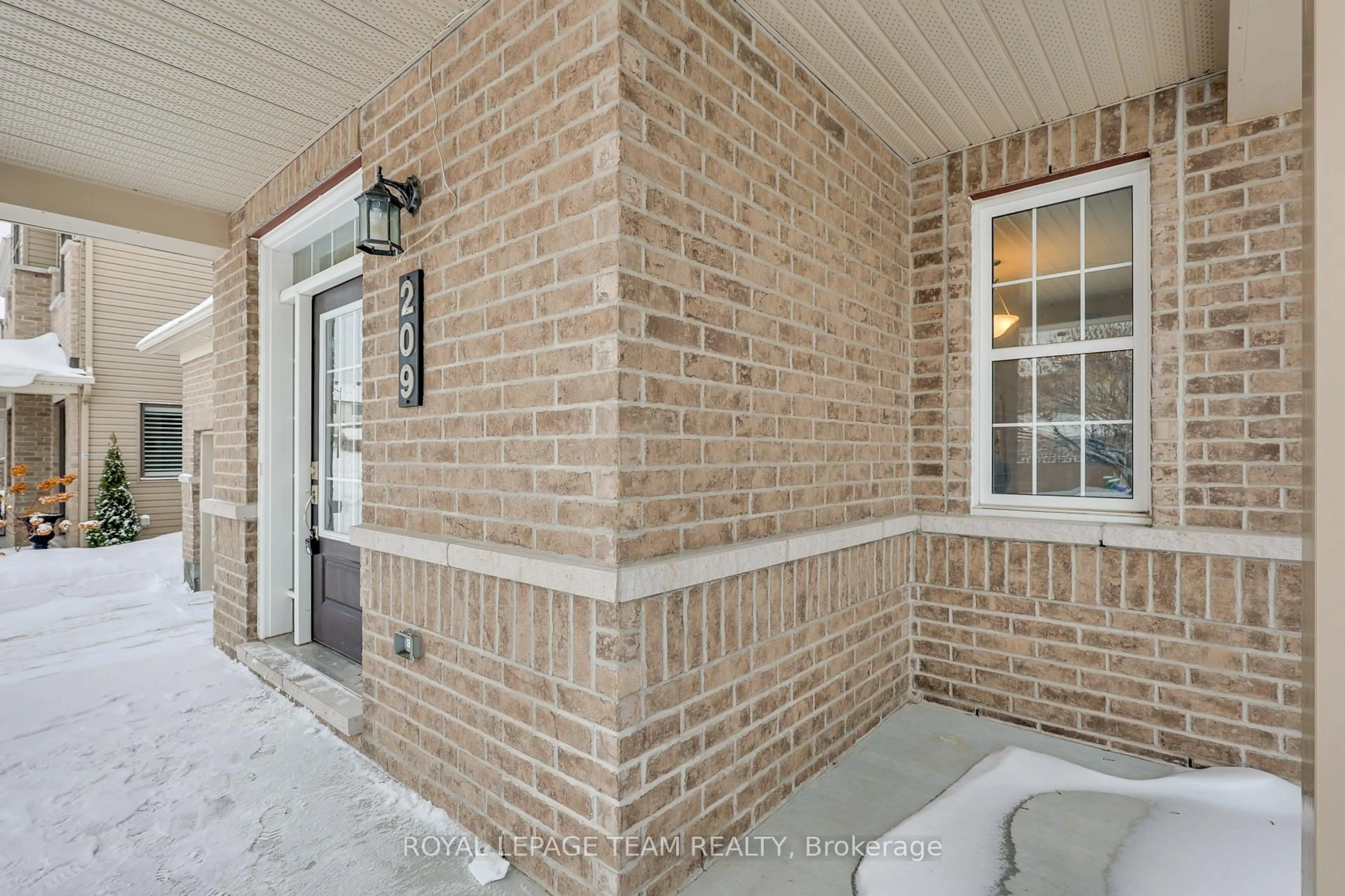 Home with brick exterior material, street for 209 Mission Trail Cres, Ottawa Ontario K2T 0H7