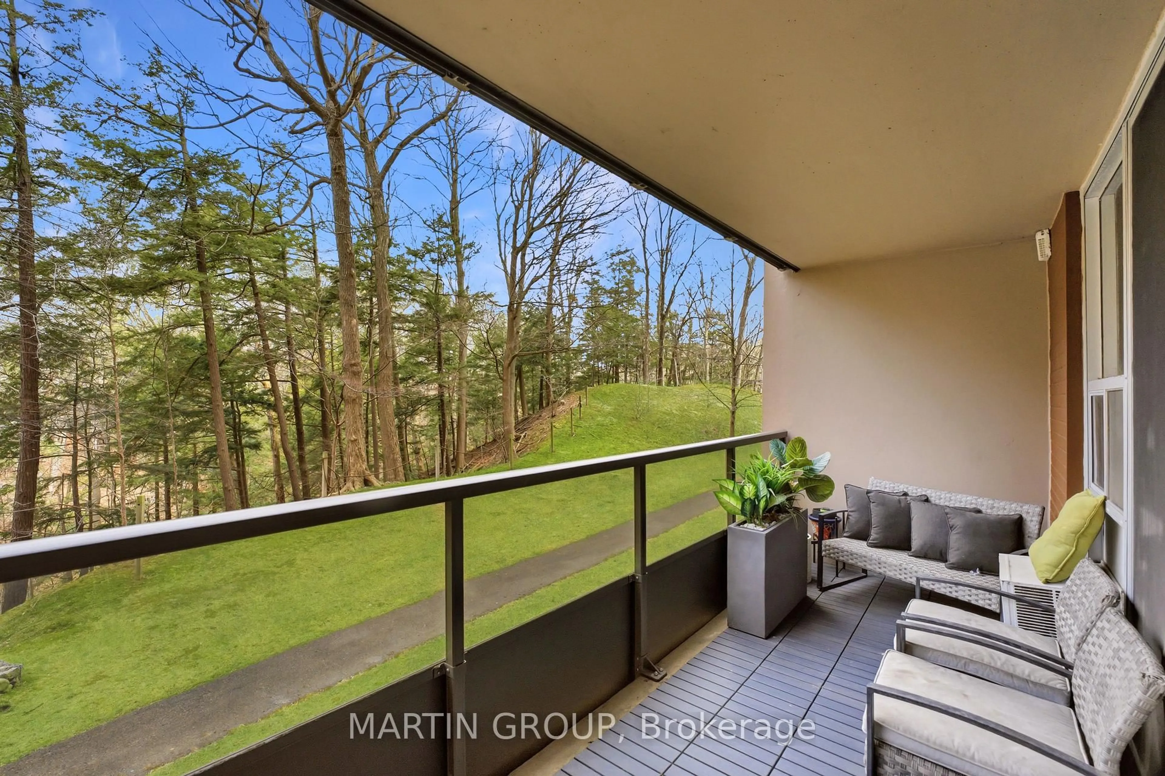 Patio, forest/trees view for 1968 Main St #103, Hamilton Ontario L8S 1J7