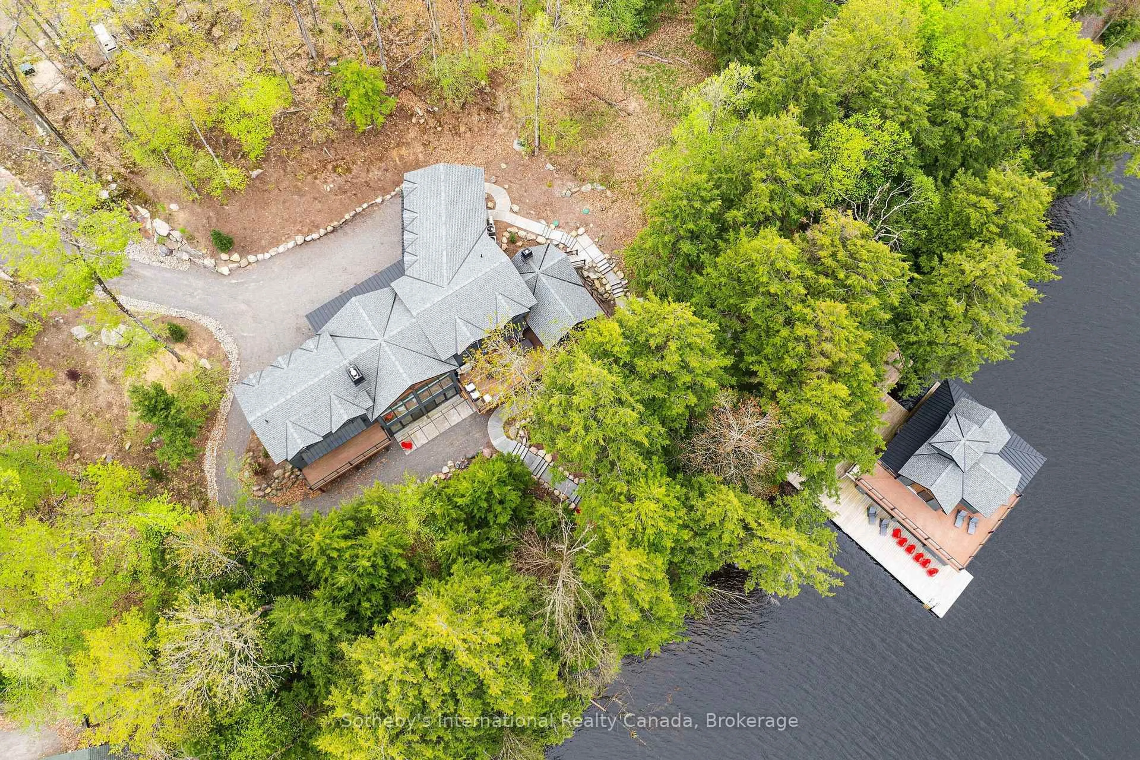 A pic from outside/outdoor area/front of a property/back of a property/a pic from drone, water/lake/river/ocean view for 1316 East Bay Rd #4A, Muskoka Lakes Ontario P0C 1M0