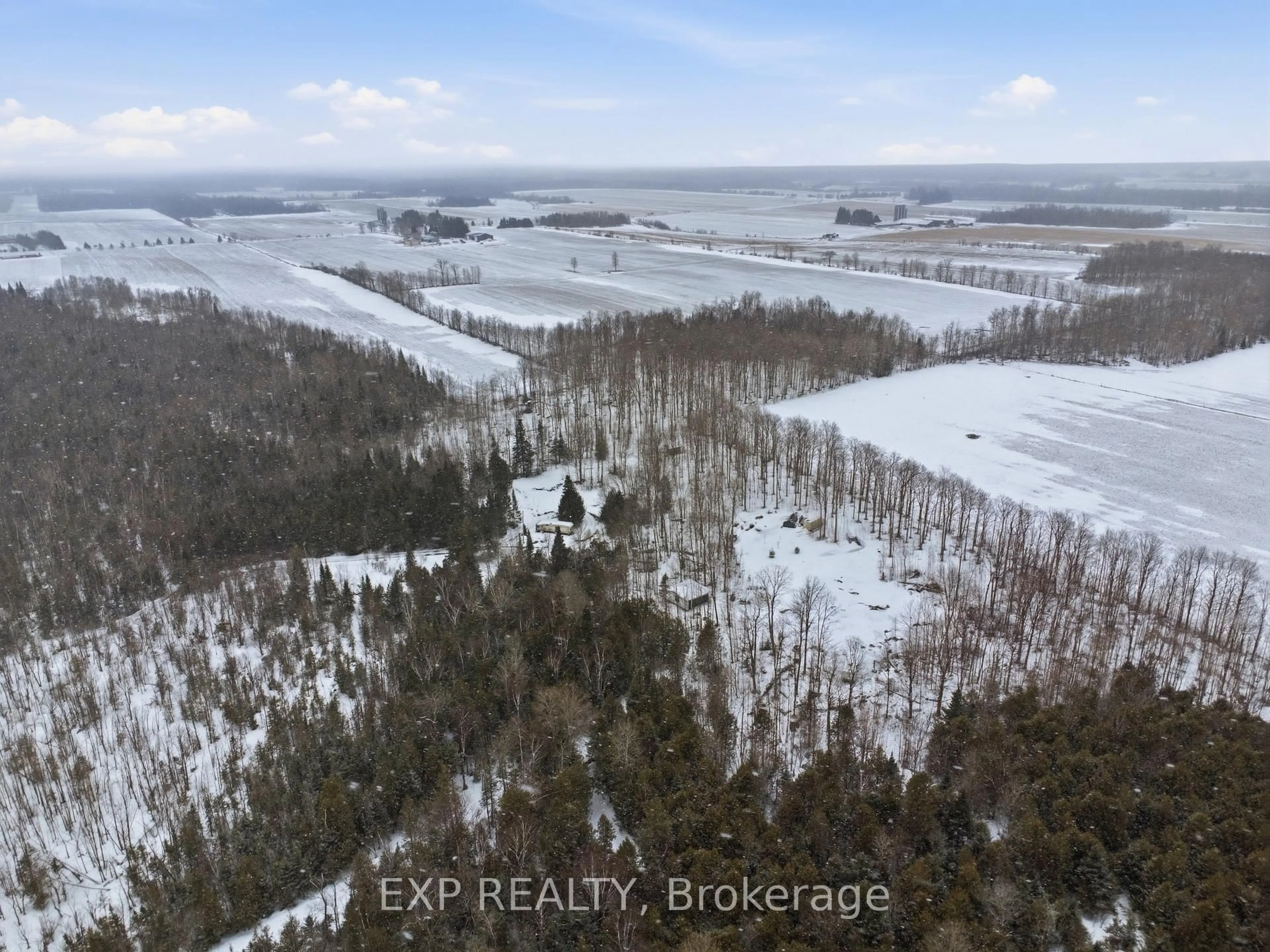 A pic from outside/outdoor area/front of a property/back of a property/a pic from drone, forest/trees view for 112314 Grey County Road 14 Rd, Southgate Ontario N0C 1B0