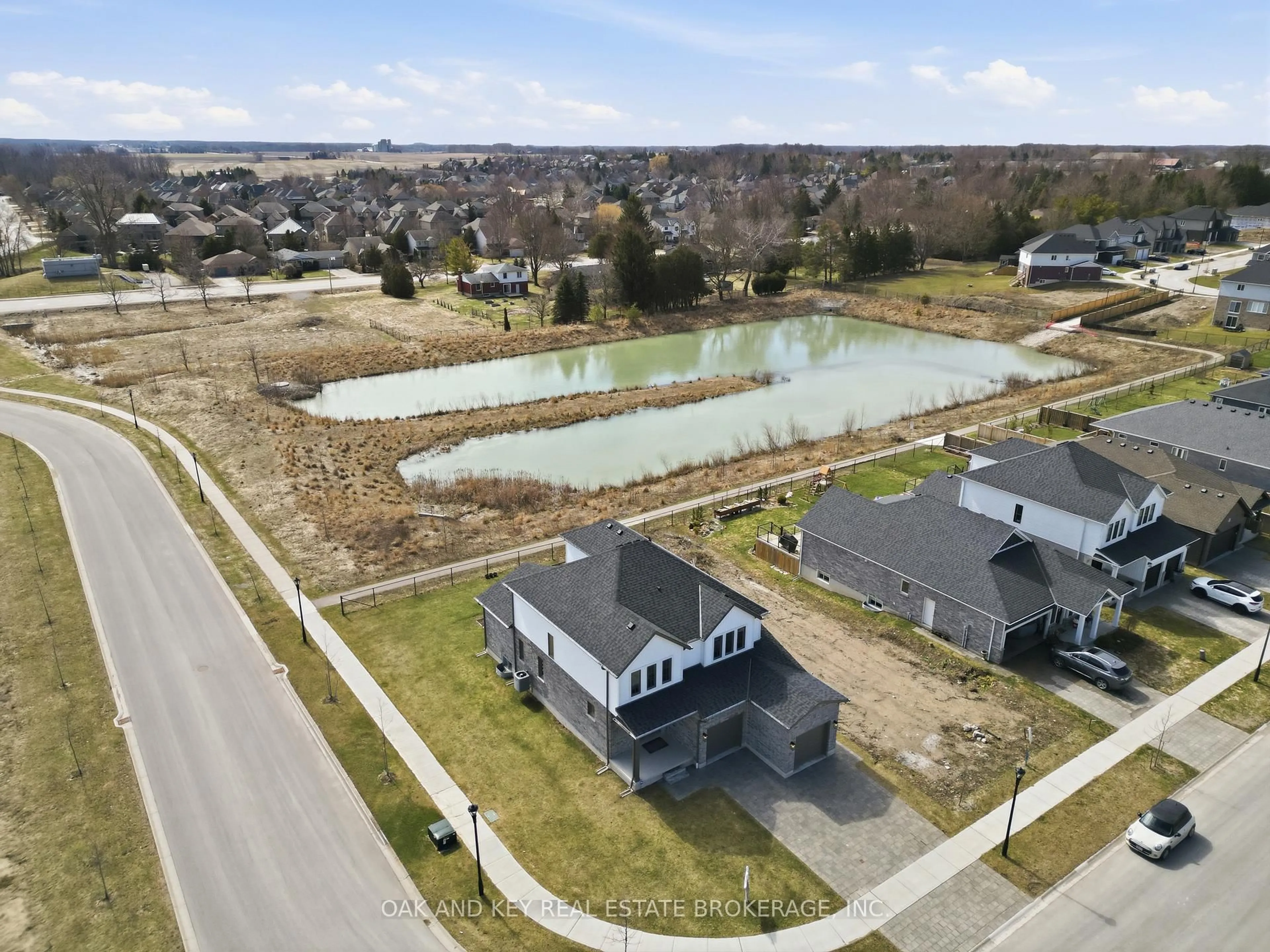 A pic from outside/outdoor area/front of a property/back of a property/a pic from drone, water/lake/river/ocean view for 11 Bowman Dr, Middlesex Centre Ontario N0M 2A0