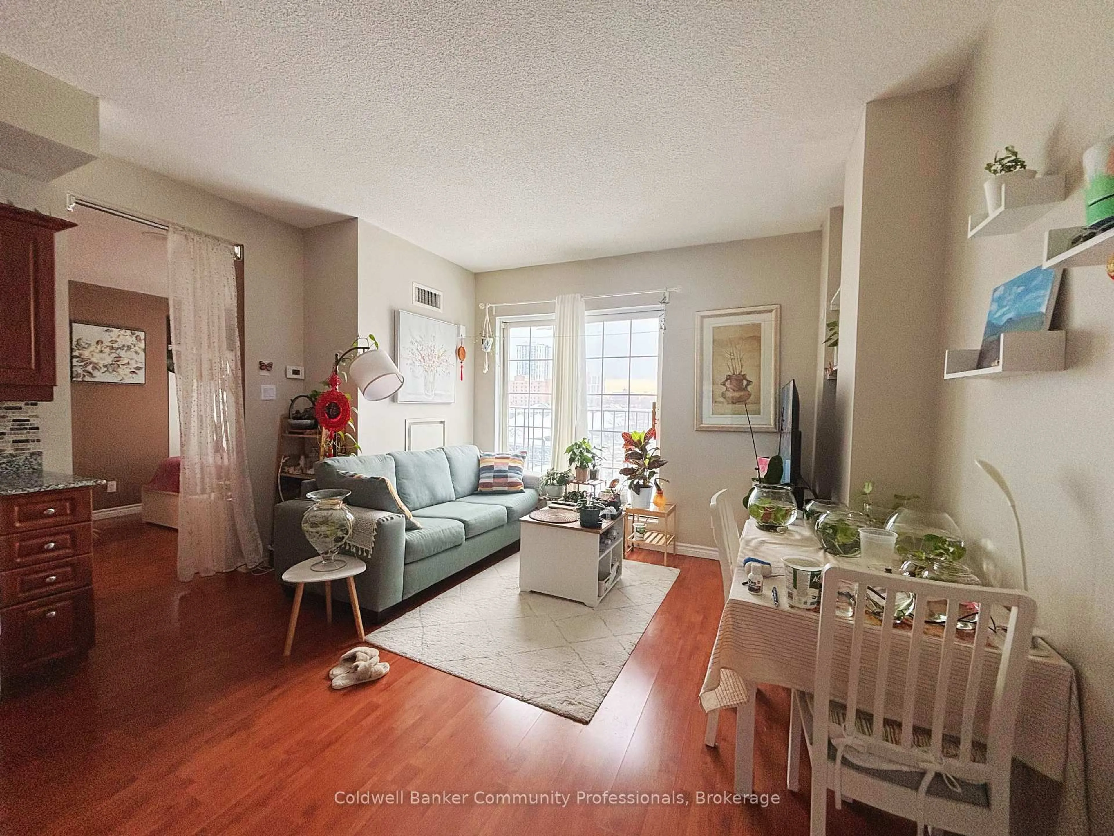 Living room with furniture, unknown for 135 James St #304, Hamilton Ontario L8P 2Z6
