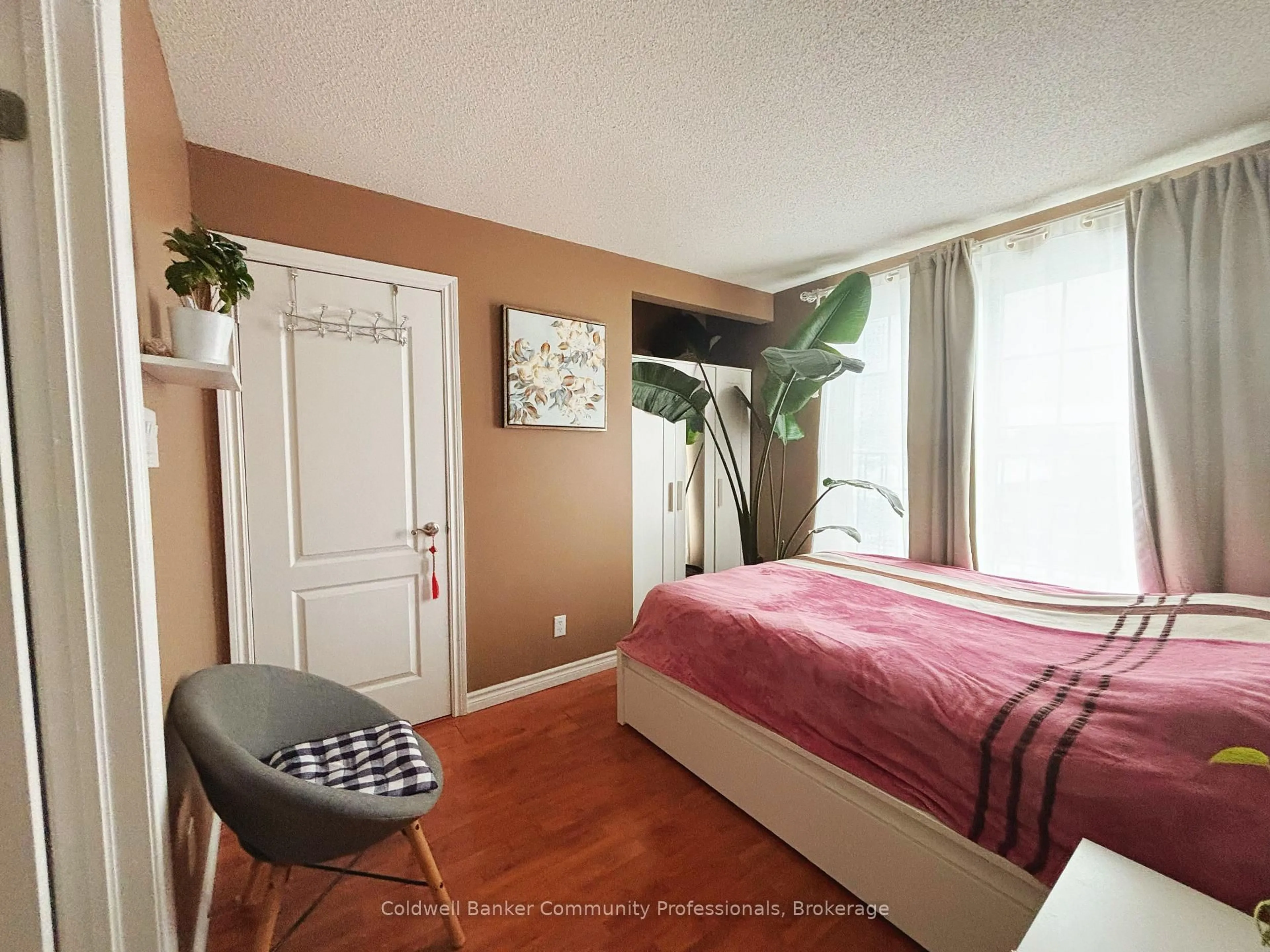 Bedroom with bed, unknown for 135 James St #304, Hamilton Ontario L8P 2Z6