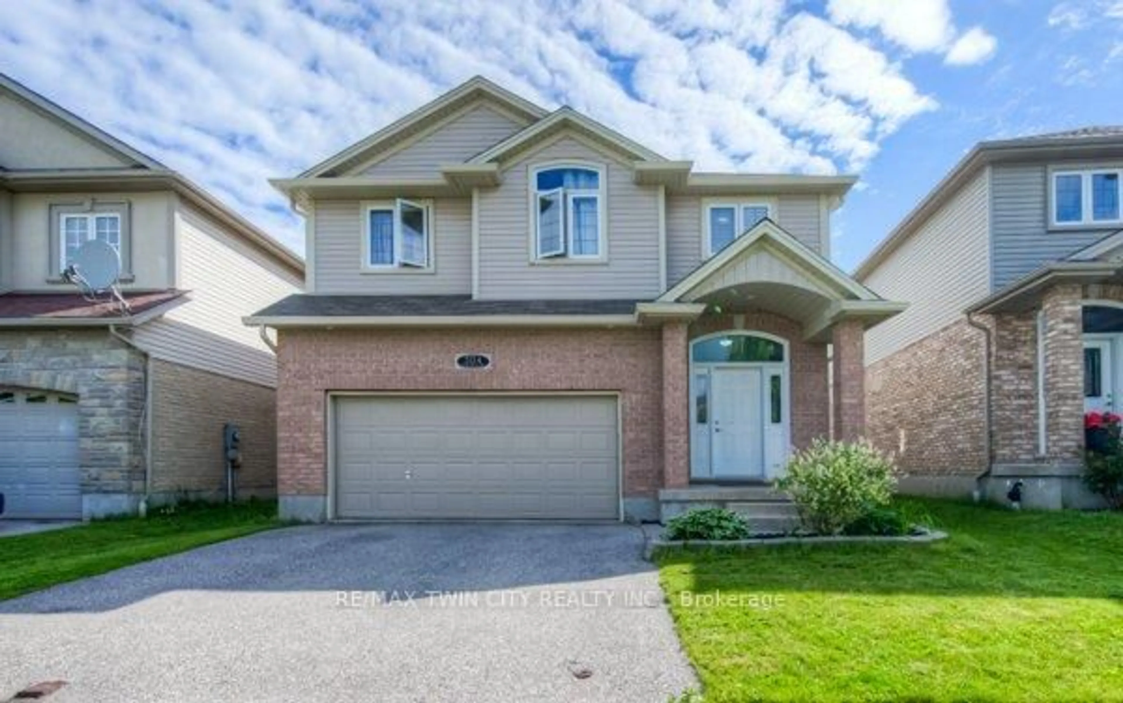 Home with brick exterior material, street for 504 Wood Nettle Way, Waterloo Ontario N2V 2Y1