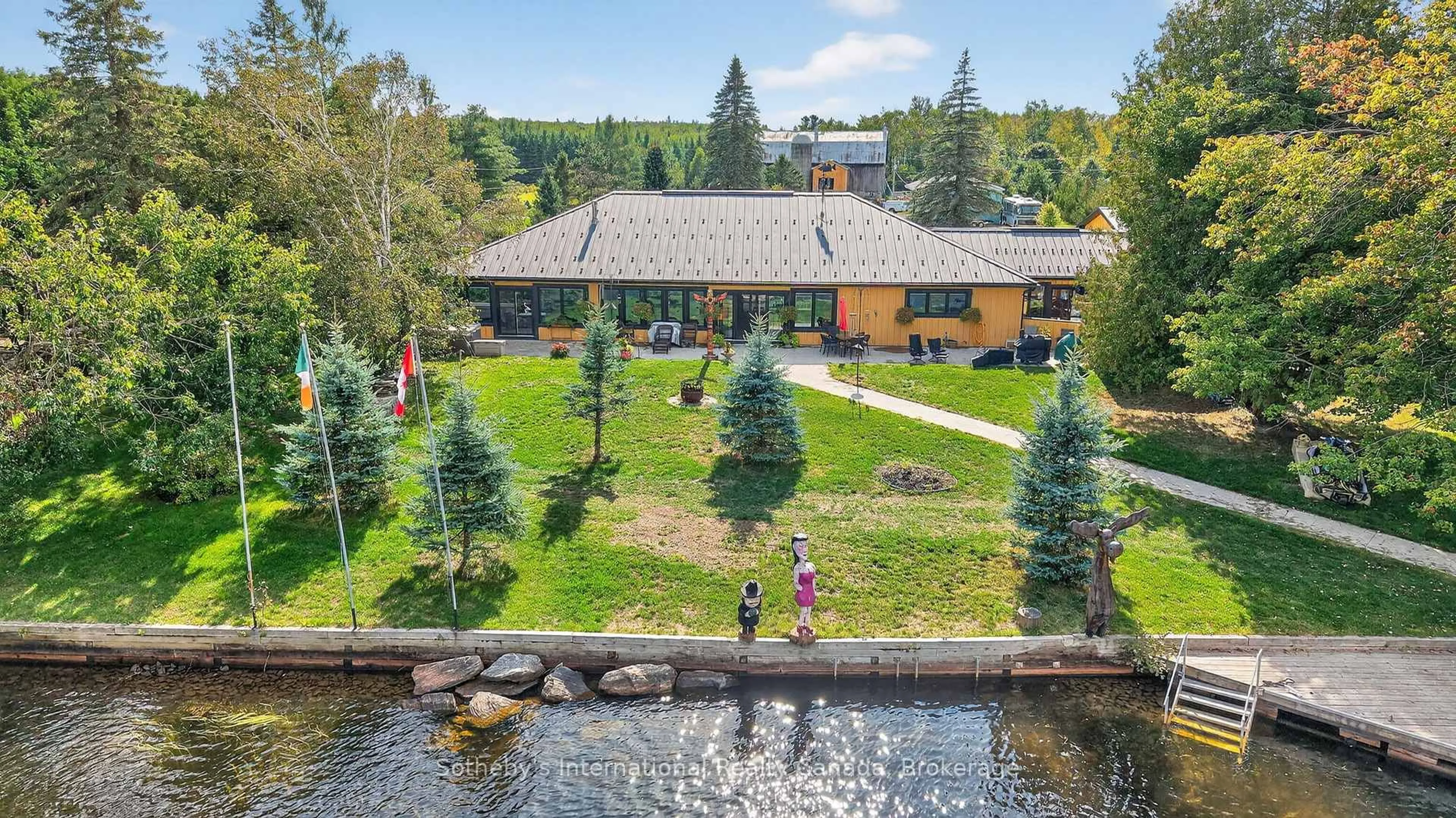 A pic from outside/outdoor area/front of a property/back of a property/a pic from drone, water/lake/river/ocean view for 1082 Beaumont Farm Rd, Bracebridge Ontario P1L 1X2