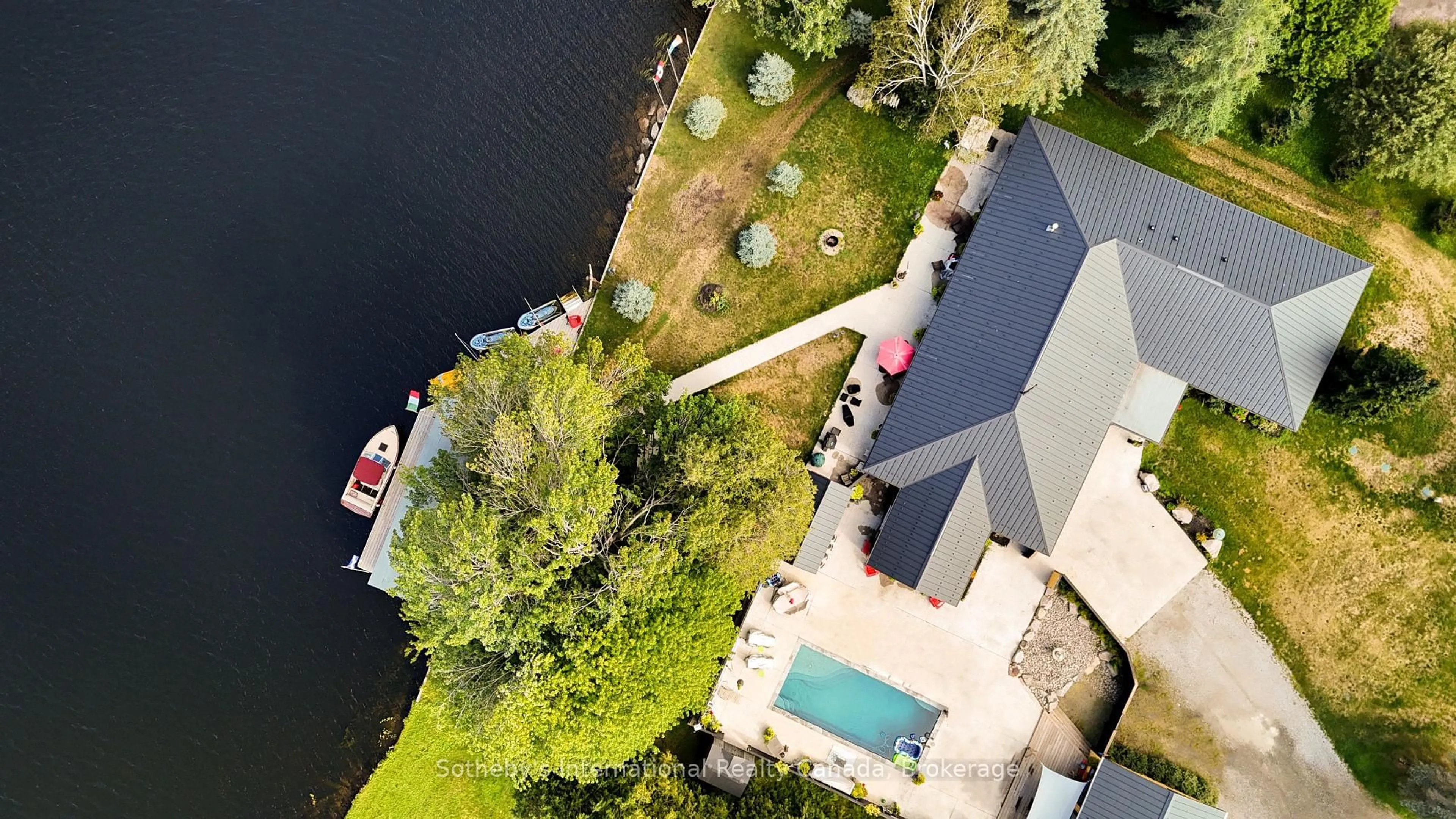 A pic from outside/outdoor area/front of a property/back of a property/a pic from drone, water/lake/river/ocean view for 1082 Beaumont Farm Rd, Bracebridge Ontario P1L 1X2